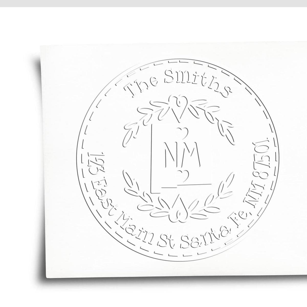White custom stamp seal design with black circular monogram, laurel wreath, and The Smiths text.