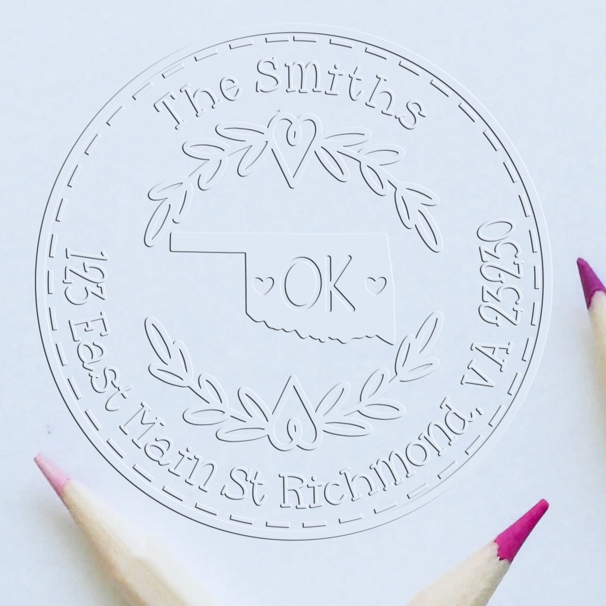 Transparent custom stamp seal for The Smiths, with Oklahoma OK outline, wreath, and pink pencil tips on white.