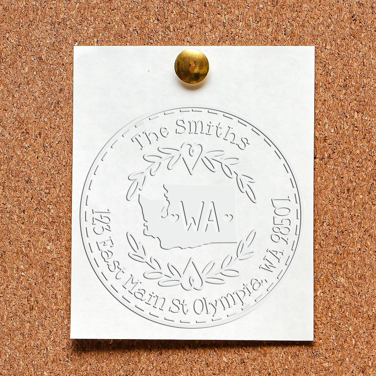 Trodat Washington state decorative mailing address seal stamp in use, featuring a customizable design for personalized correspondence.