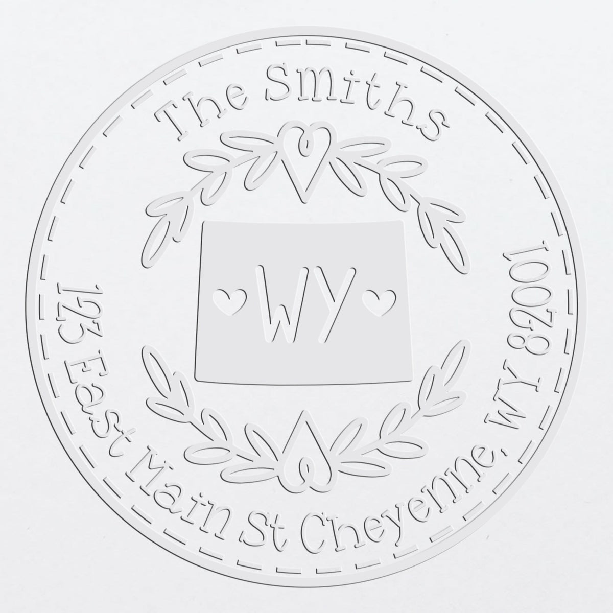 White embossed circular seal stamp for The Smiths, with laurel wreath, hearts, and WY in the center.