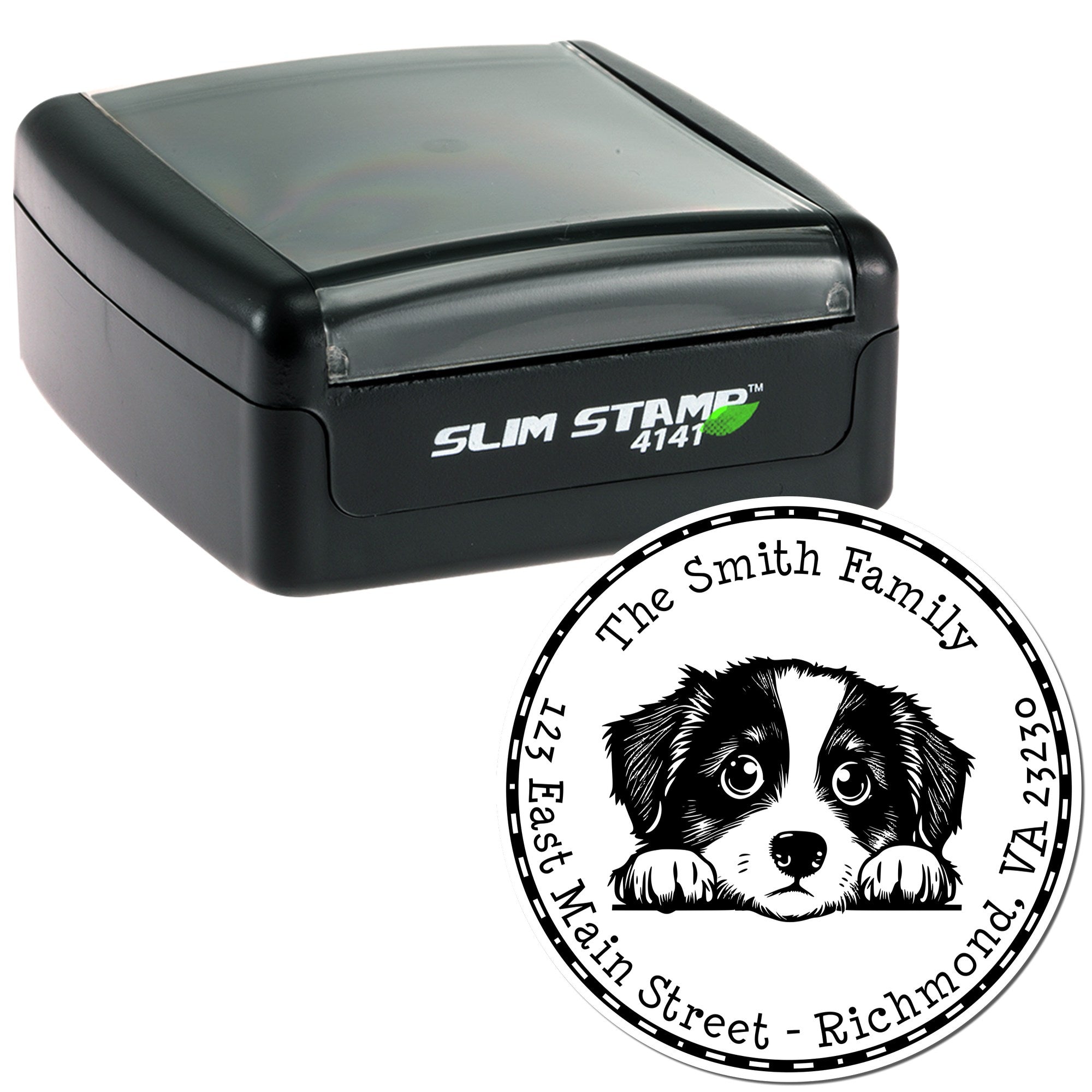 Black self-inking stamp with clear gray cover and round custom seal showing a black-and-white dog and family name.