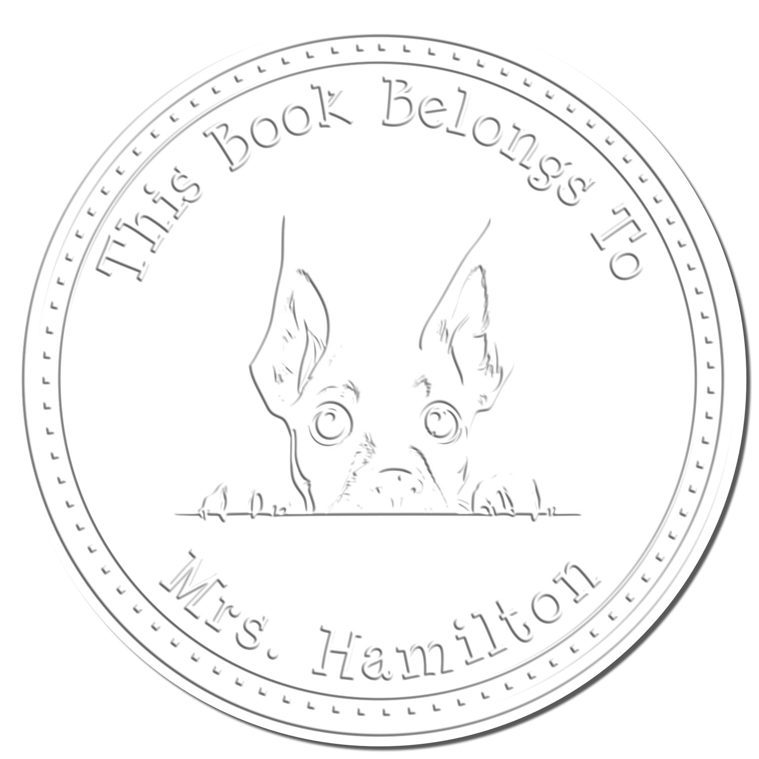 Circular gray book stamp and seal with peeking dog and text This Book Belongs to Mrs. Hamilton.