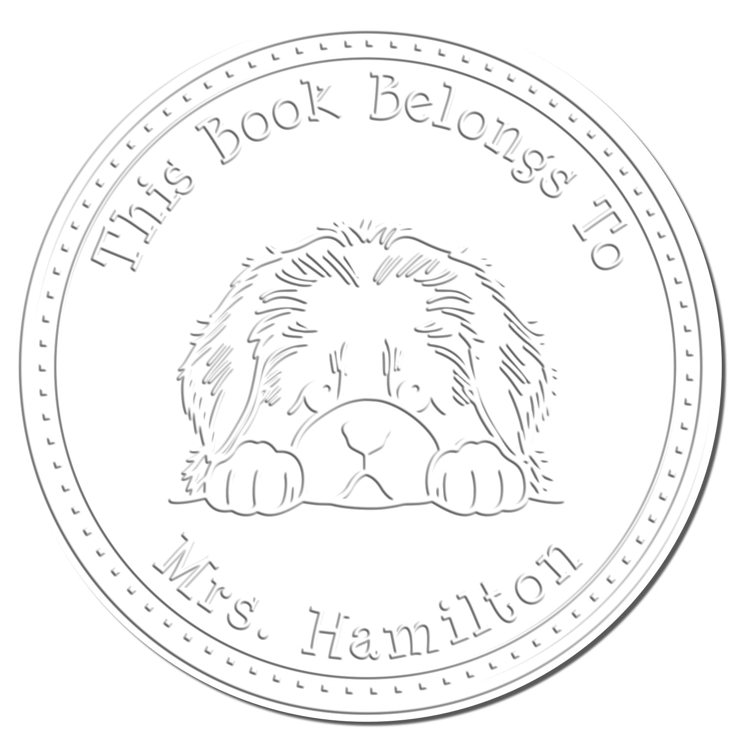 Circular white-and-gray personalized stamp seal with a dog illustration and This Book Belongs To Mrs. Hamilton text