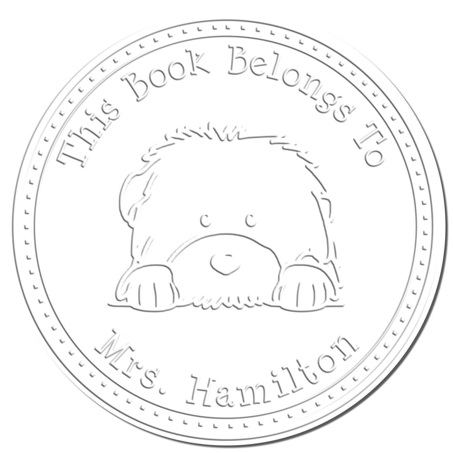 Round white embossed book stamp seal with teddy bear and text This Book Belongs to Mrs. Hamilton