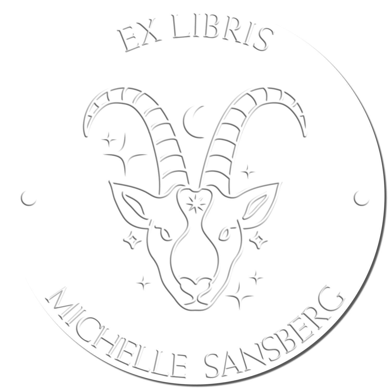 White circular embossing seal stamp with silver ram head logo and engraved EX LIBRIS MICHELLE SANSBERG text.