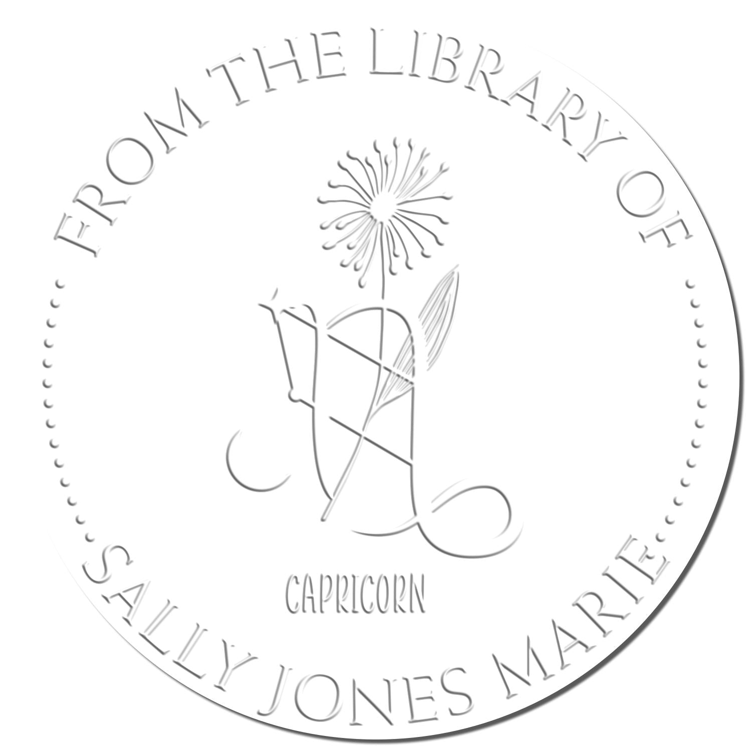 Circular silver embossed seal stamp reading From the Library of Sally Jones Marie with Capricorn symbol and Capricorn text.