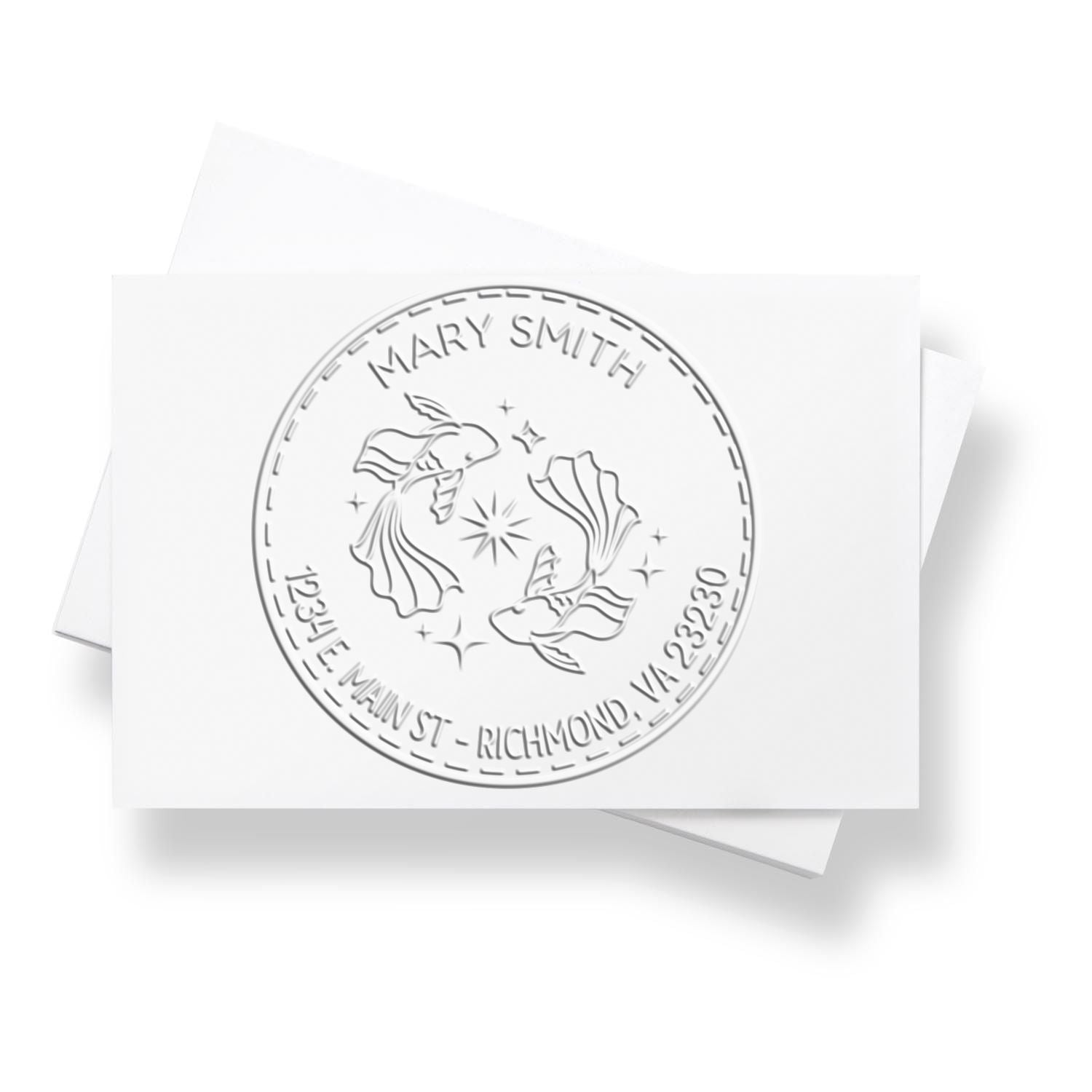White embossed round stamp seal for Mary Smith, with fish design and Richmond, VA address on layered white cards.