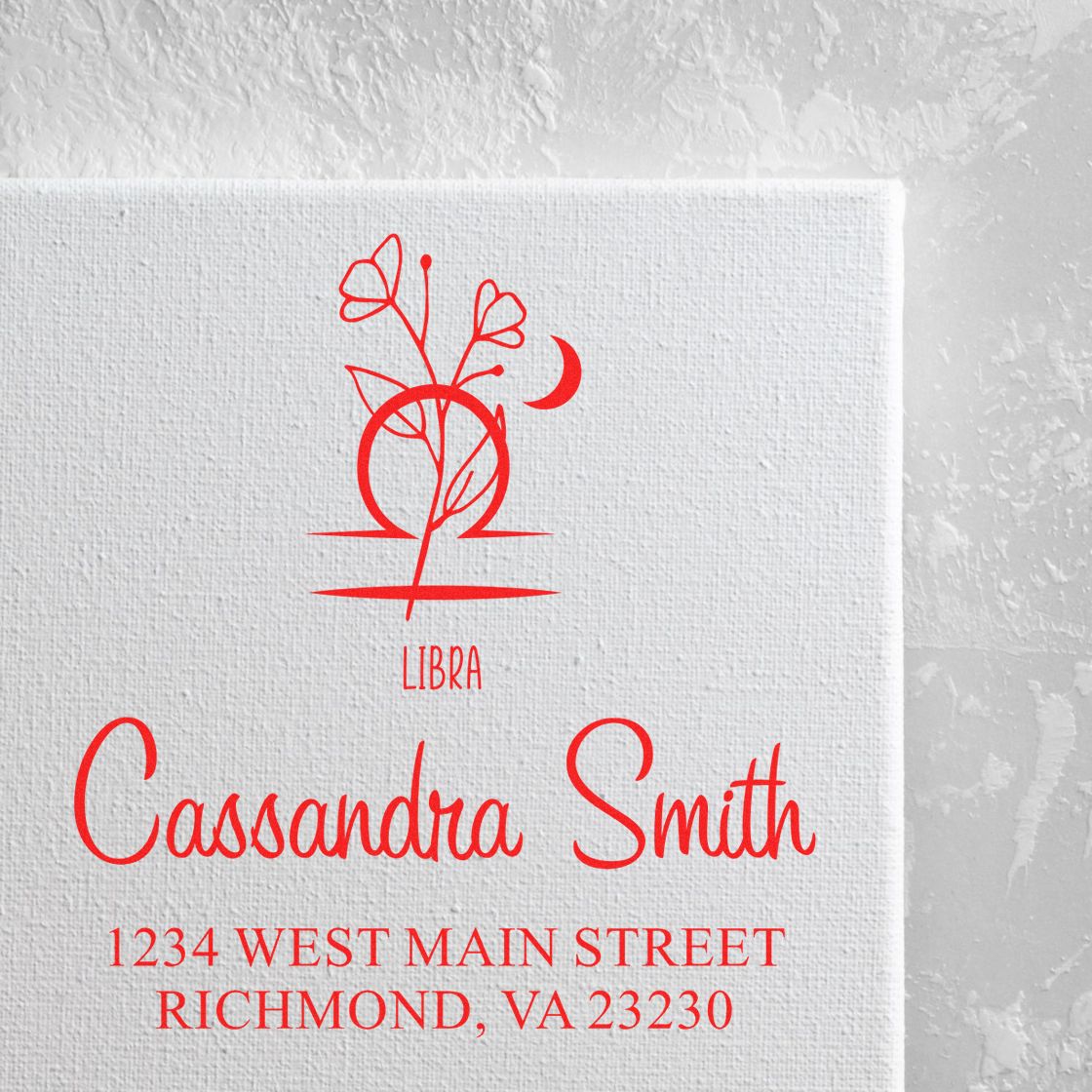 Red Libra floral stamp and seal design with Cassandra Smith and 1234 West Main Street on textured white card.
