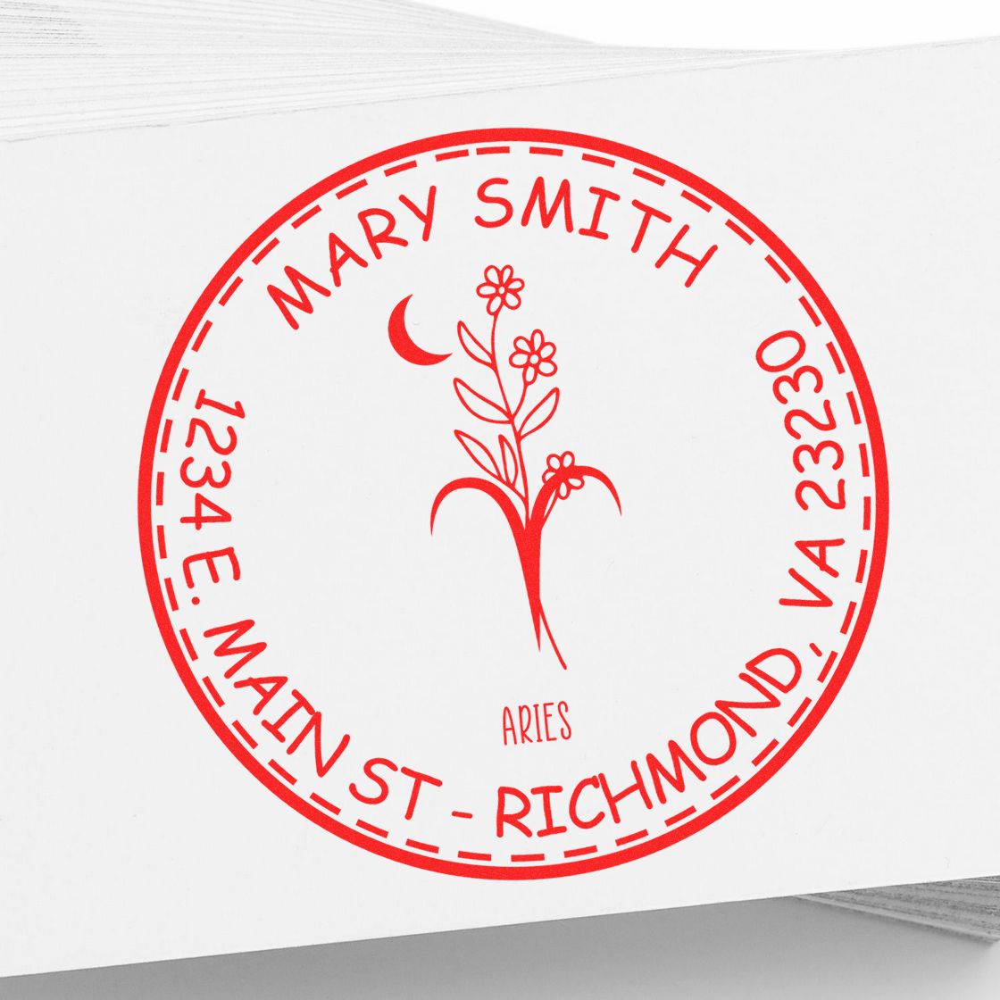 Red circular custom stamp seal with Mary Smith name, Aries symbol, floral design, and Richmond, VA address on white paper