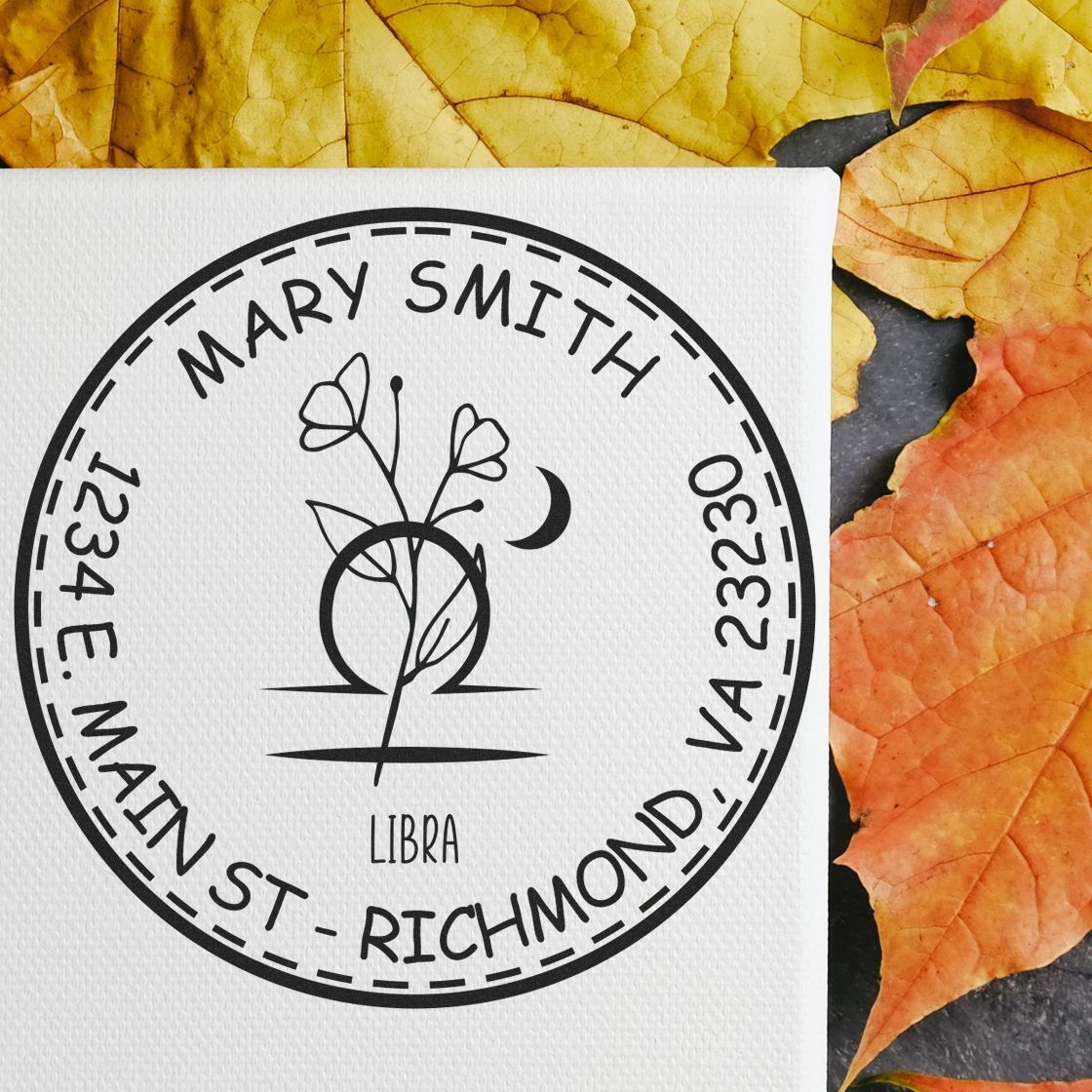 Black custom Libra stamp seal for Mary Smith with floral moon design, 1234 E. Main St., Richmond, VA 23230.