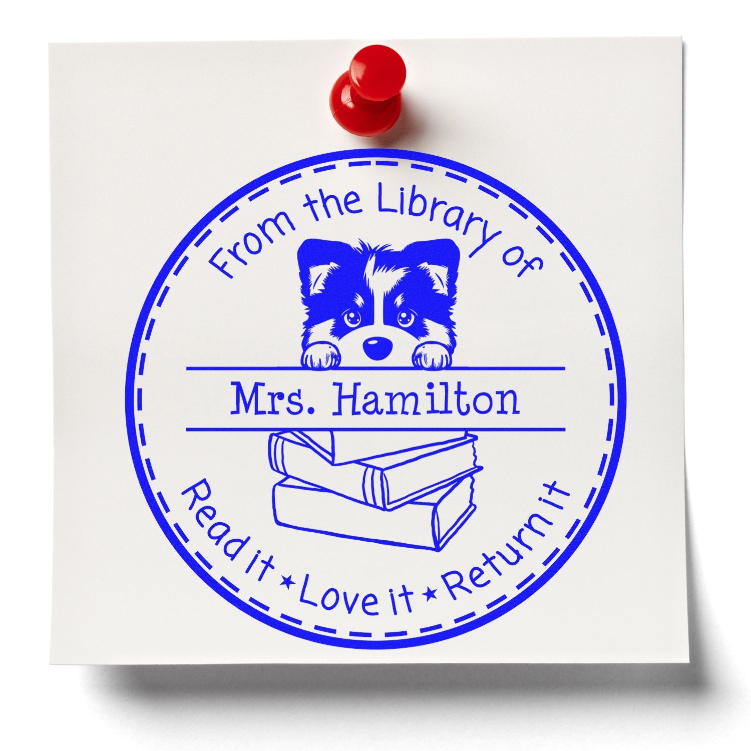 Blue circular library stamp and seal for Mrs. Hamilton with raccoon, books, and red pushpin on white paper.