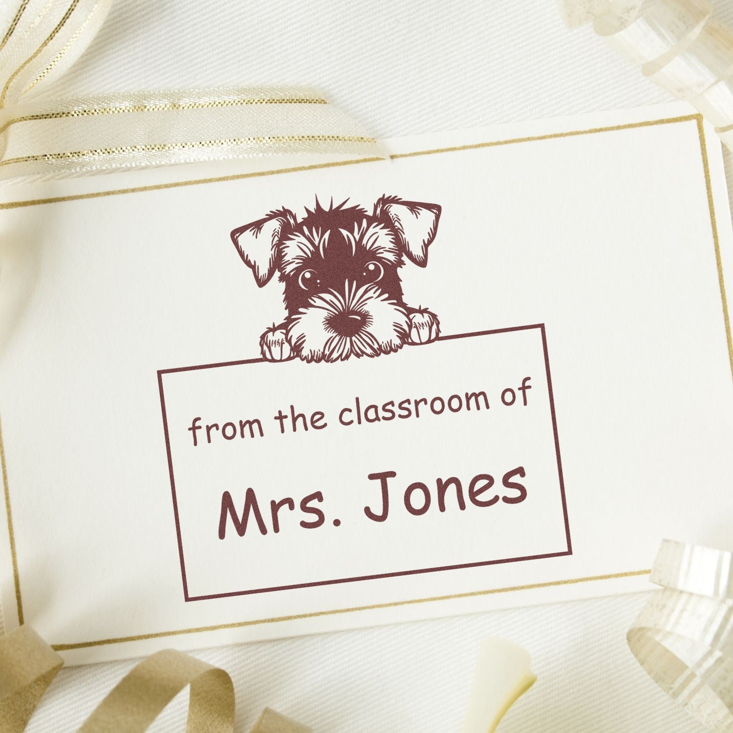 Burgundy dog classroom stamp seal for Mrs. Jones on cream paper with gold border and ribbon accents.