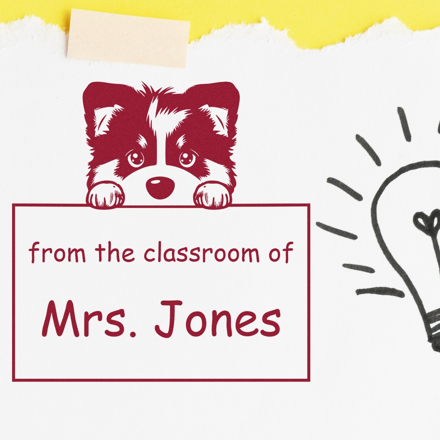 Custom red classroom stamp with raccoon, reading "from the classroom of Mrs. Jones" on white paper with yellow tape.