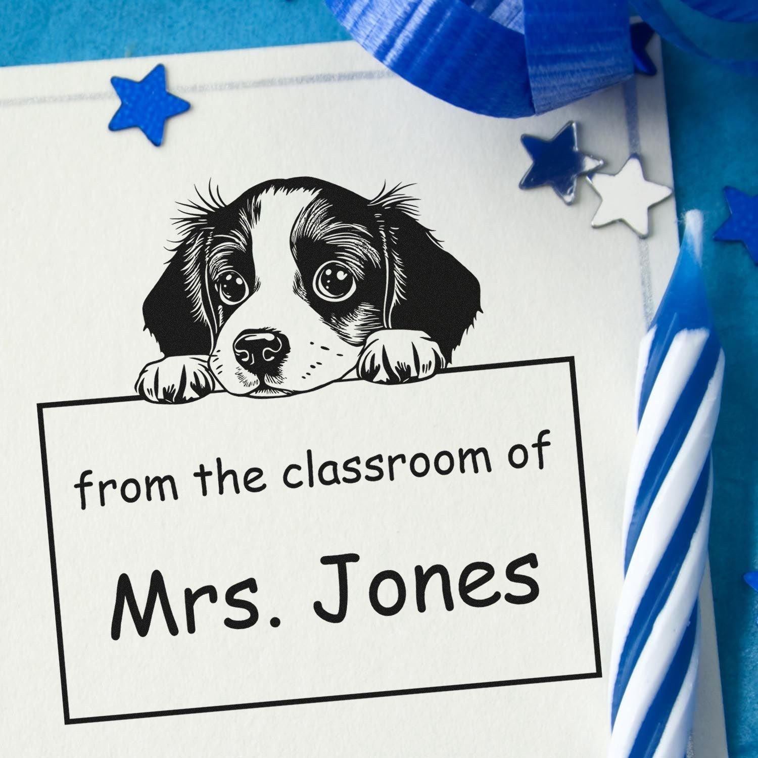 Black puppy stamp and blue-white star seals framing a classroom sign for Mrs. Jones on a blue background.