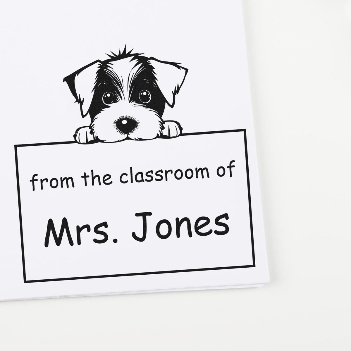 Black-and-white teacher stamp and seal with puppy peeking over a sign reading from the classroom of Mrs. Jones.