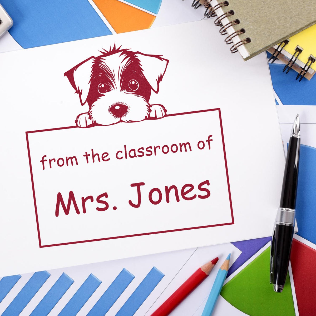 Burgundy dog classroom stamp and seal reading from the classroom of Mrs. Jones, on white paper with colorful stationery.