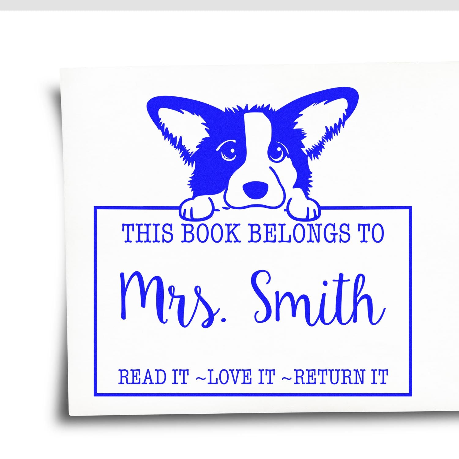Blue corgi bookplate stamp reading This Book Belongs to Mrs. Smith with Read It Love It Return It text.