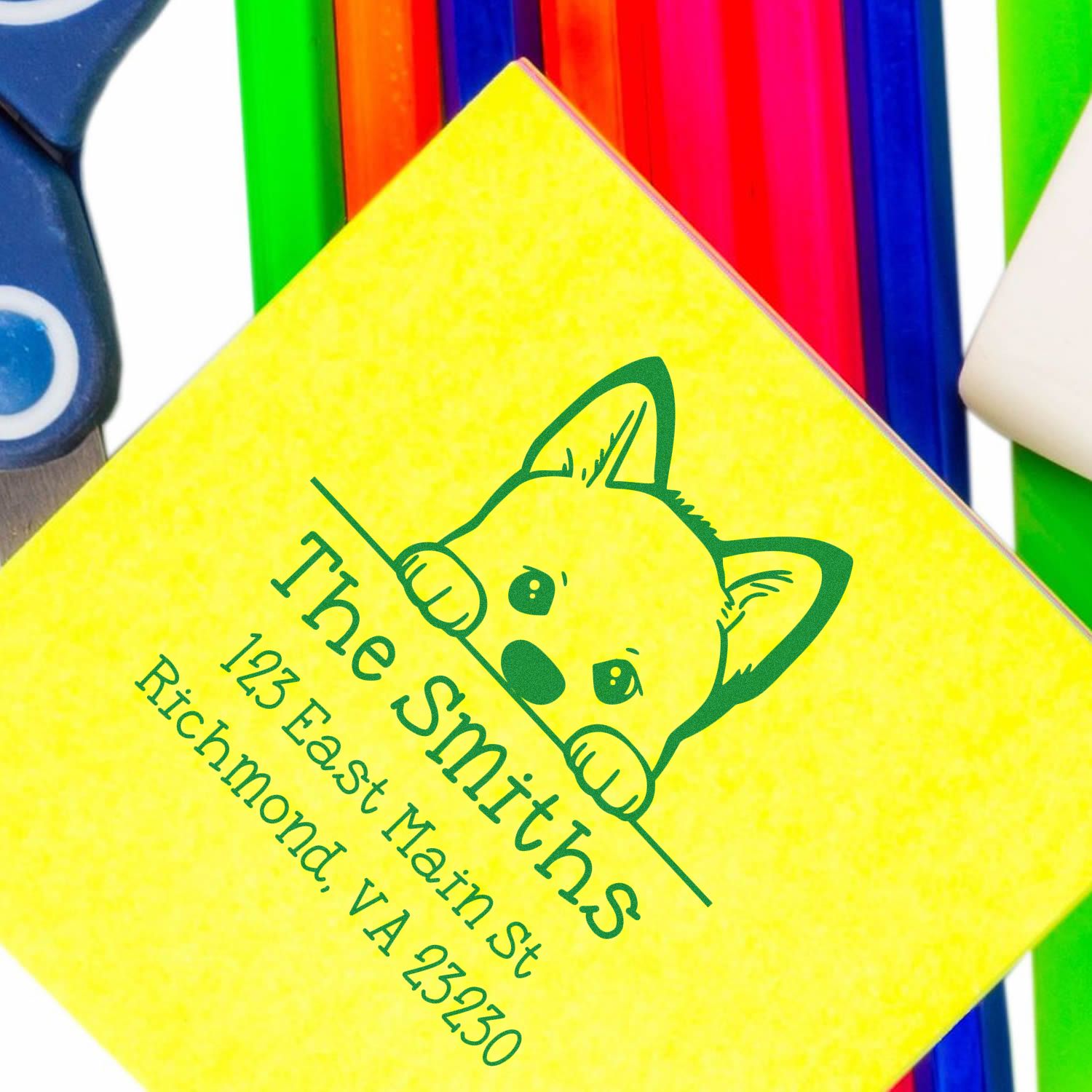 Yellow custom stamp and seal pad with green fox logo and The Smiths text, framed by bright multicolor handles.
