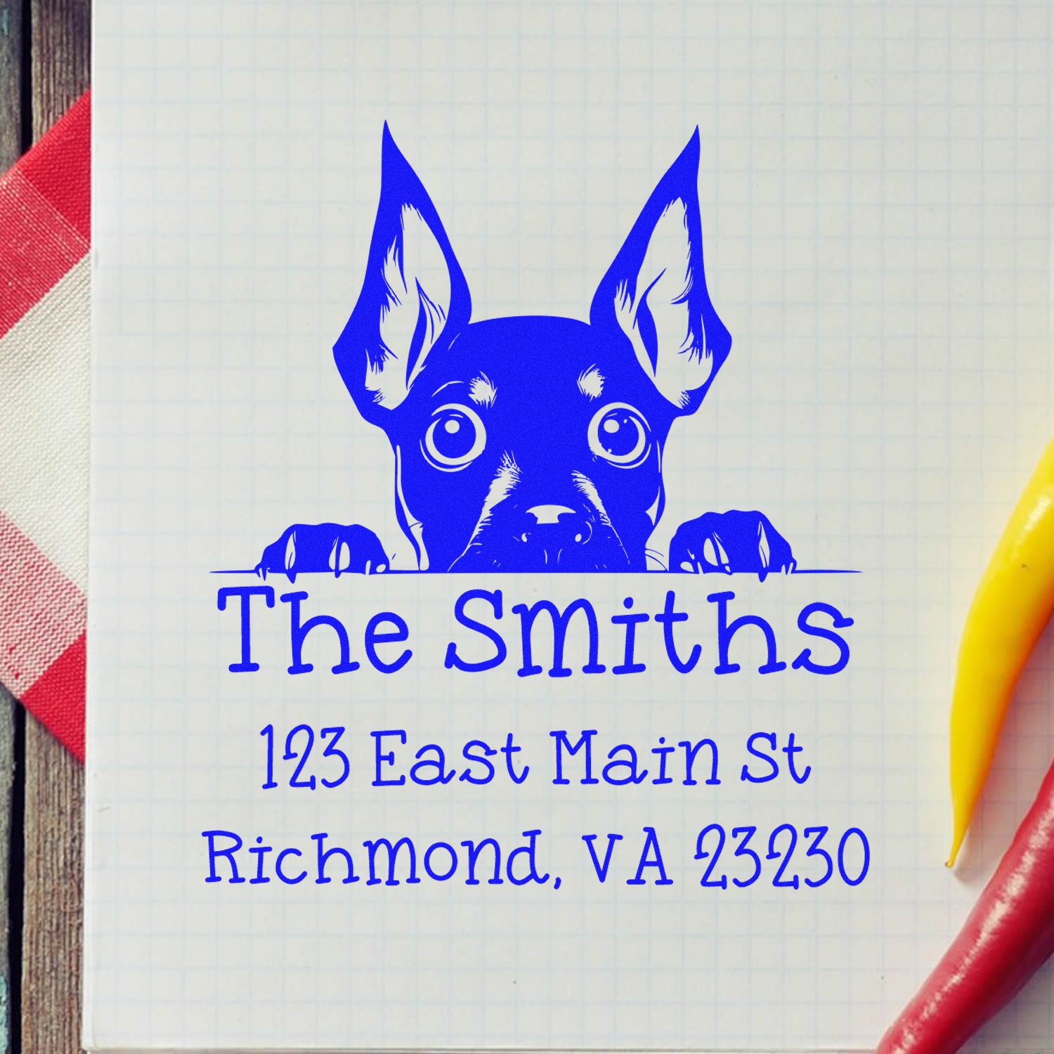 Blue custom stamp and seal with a dog peeking over The Smiths, plus Richmond, VA address in blue on white paper.