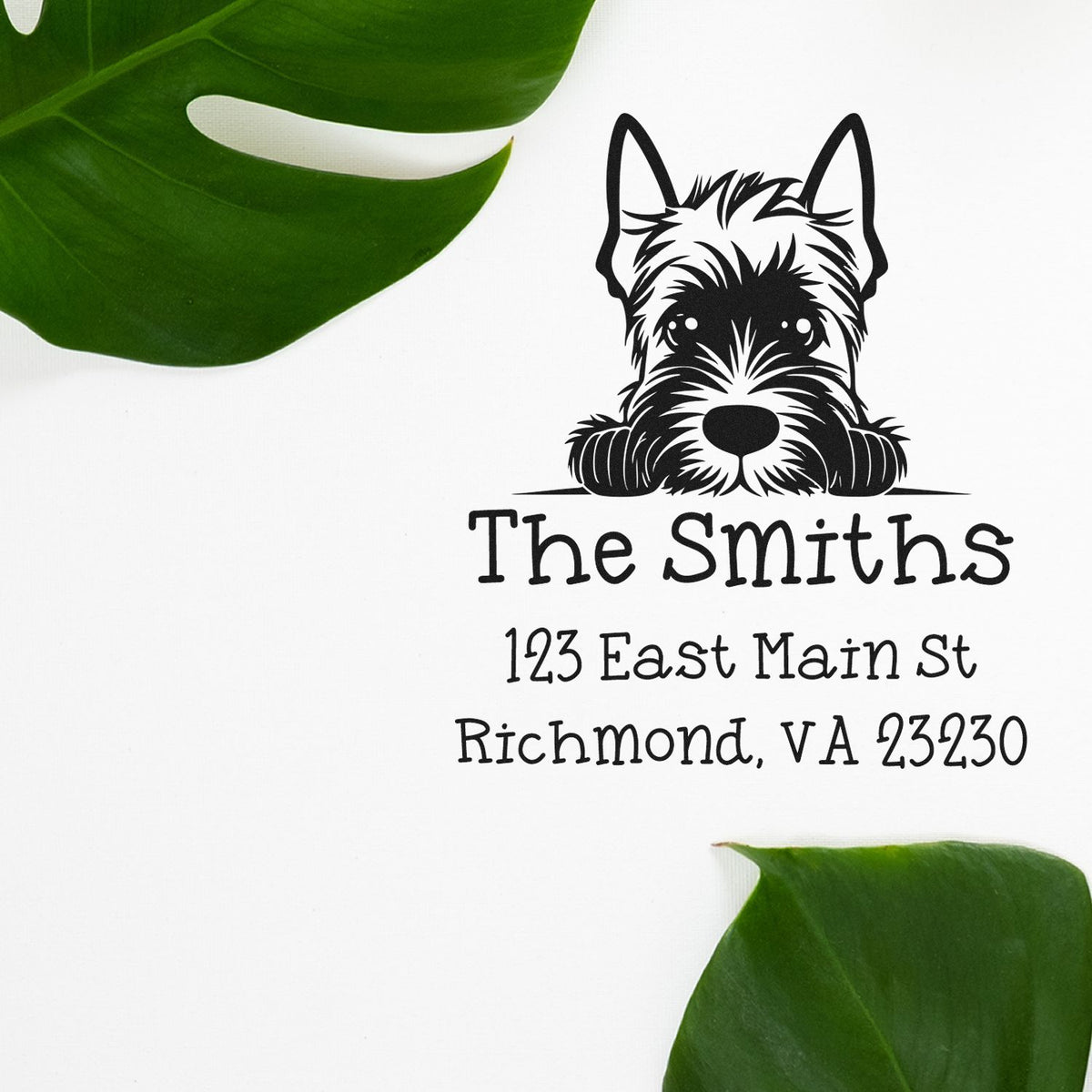 Black custom stamp and seal with Scottish terrier, The Smiths, and Richmond, VA address on white, framed by green leaves.