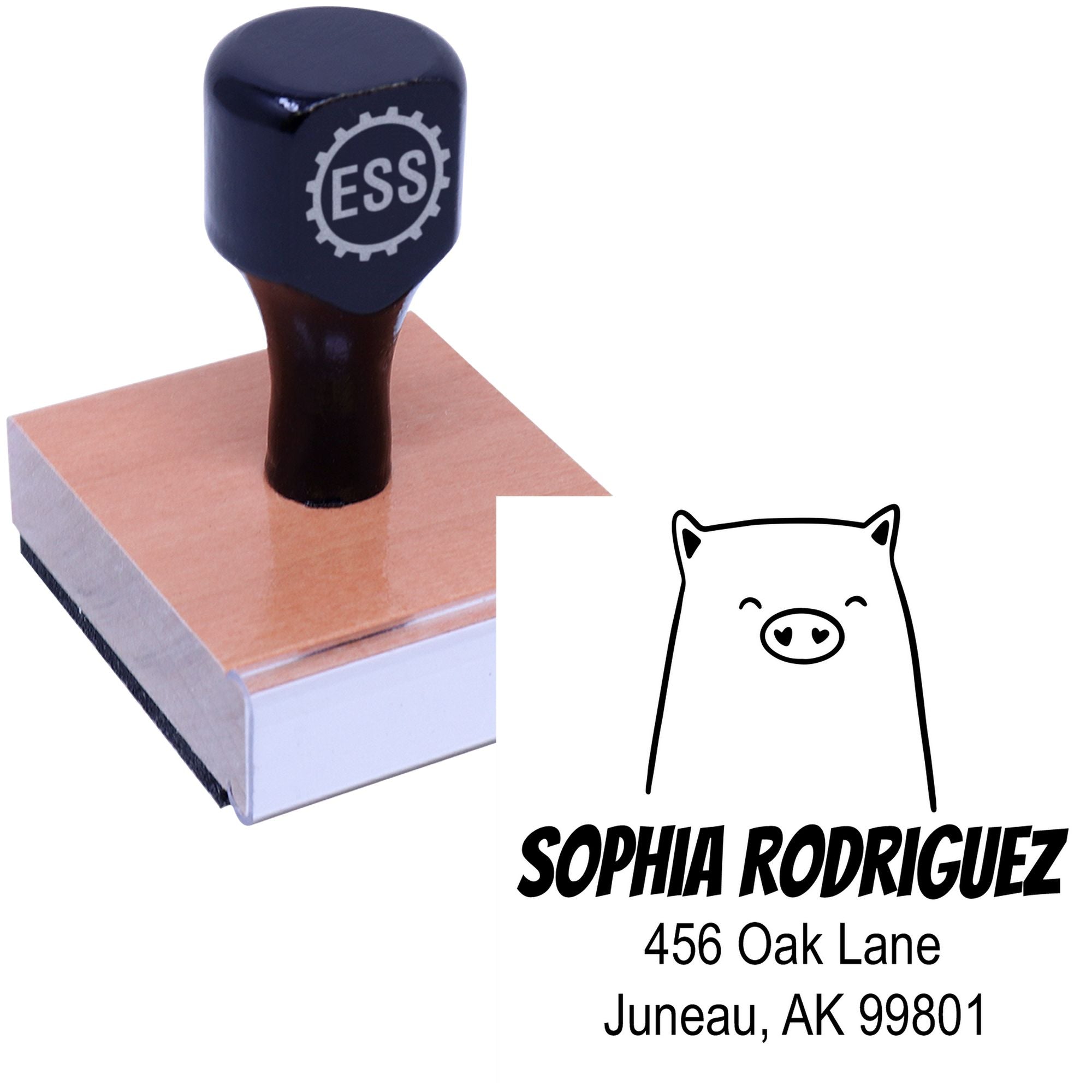 Wood handle cheery pig cartoon animal made to order address stamper with custom return mail stamper design. Features a smiling pig illustration above a name and address, paired with a wooden handle stamp.