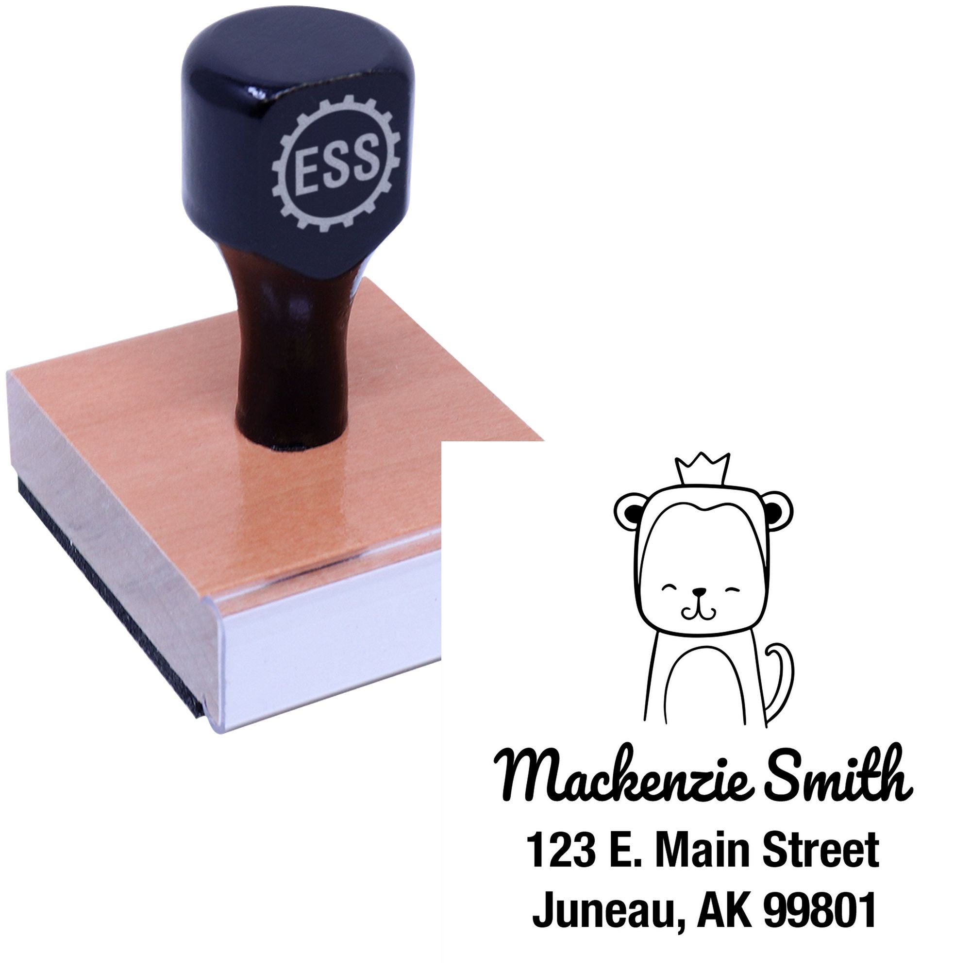 Wood handle stamp featuring a mischievous monkey cartoon animal design, labeled "Mackenzie Smith, 123 E. Main Street, Juneau, AK 99801." This customized home stamper is made to order with a personalized name and address.