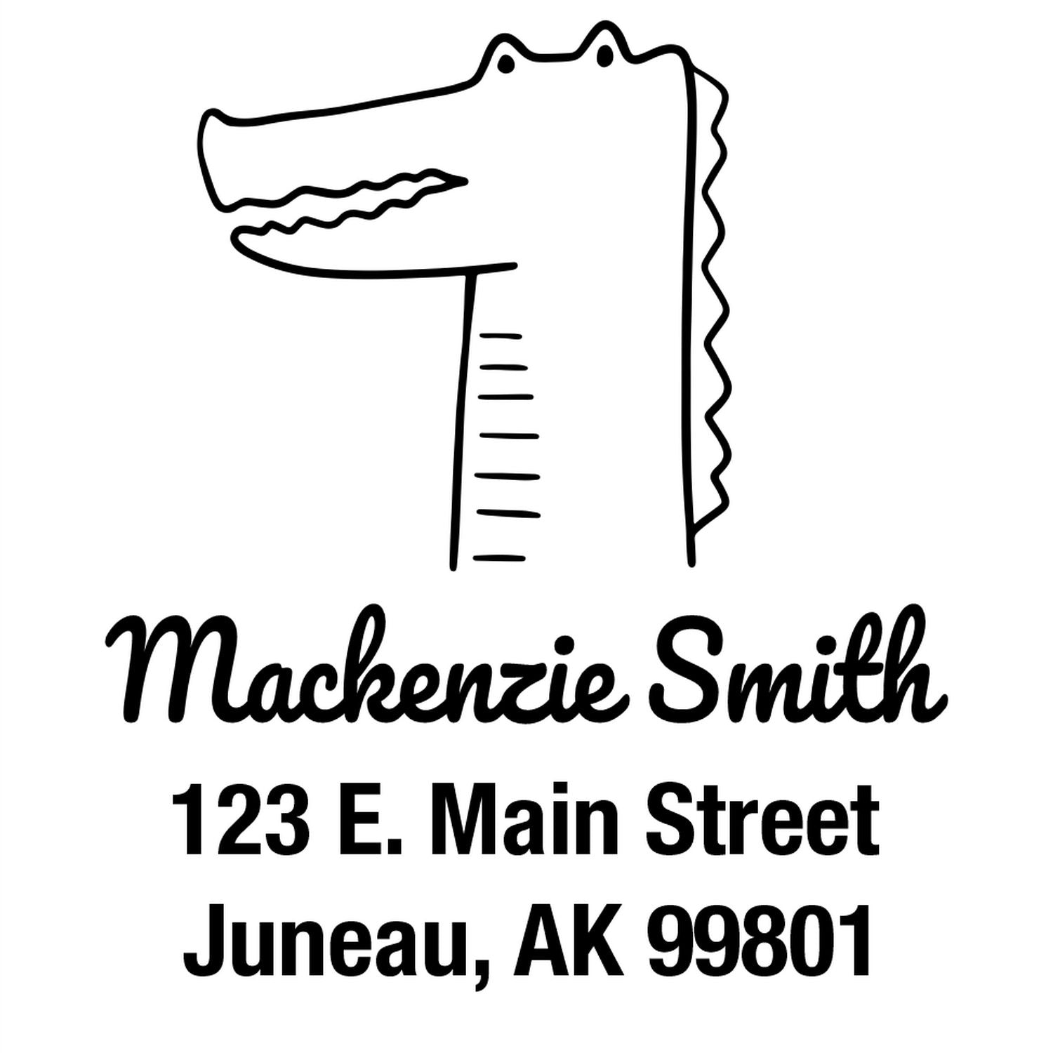Bright-Eyed Crocodile Pre-Inked Customized Return Address Stamper featuring a cartoon crocodile above the name "Mackenzie Smith" with the address "123 E. Main Street, Juneau, AK 99801." Ideal for personalized mailings.