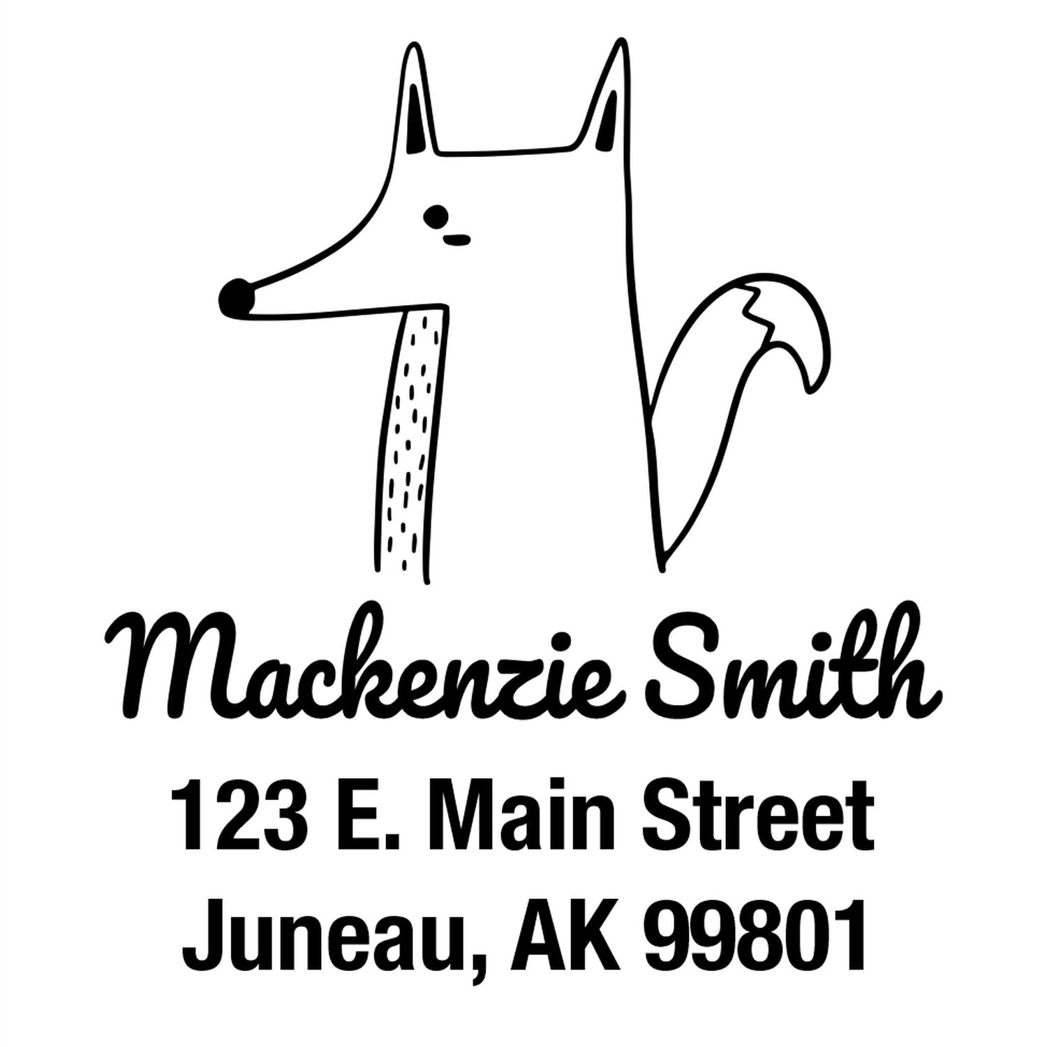 Wood Handle Finicky Fox Cartoon Animal Custom Address Stamper featuring a fox illustration above the name "Mackenzie Smith" and address "123 E. Main Street, Juneau, AK 99801." Ideal for a Customized Return Mail Stamper.