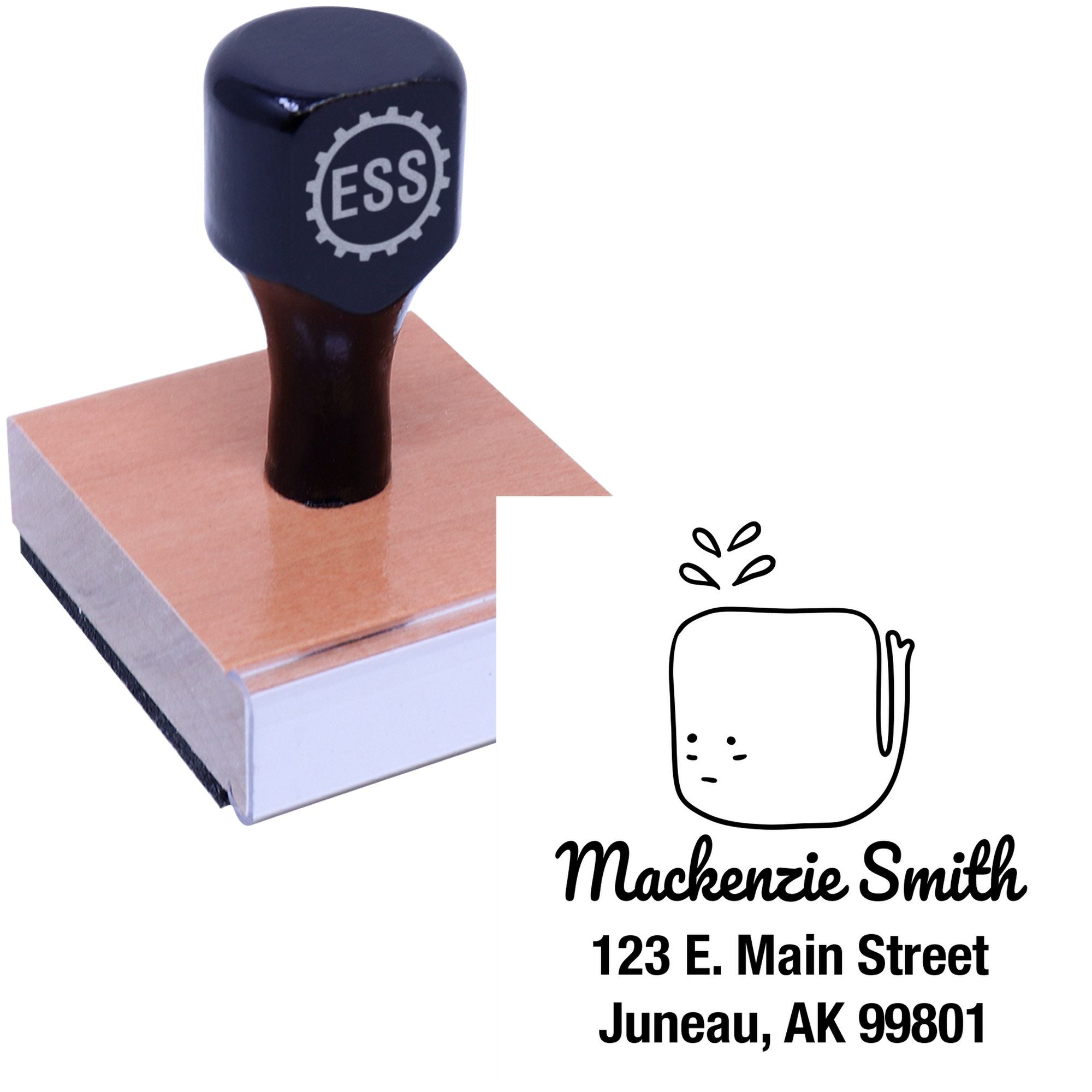 Wood handle stamp featuring a joyful whale cartoon animal design, labeled as a custom new address stamper. The stamp displays "Mackenzie Smith, 123 E. Main Street, Juneau, AK 99801" alongside the whale illustration.