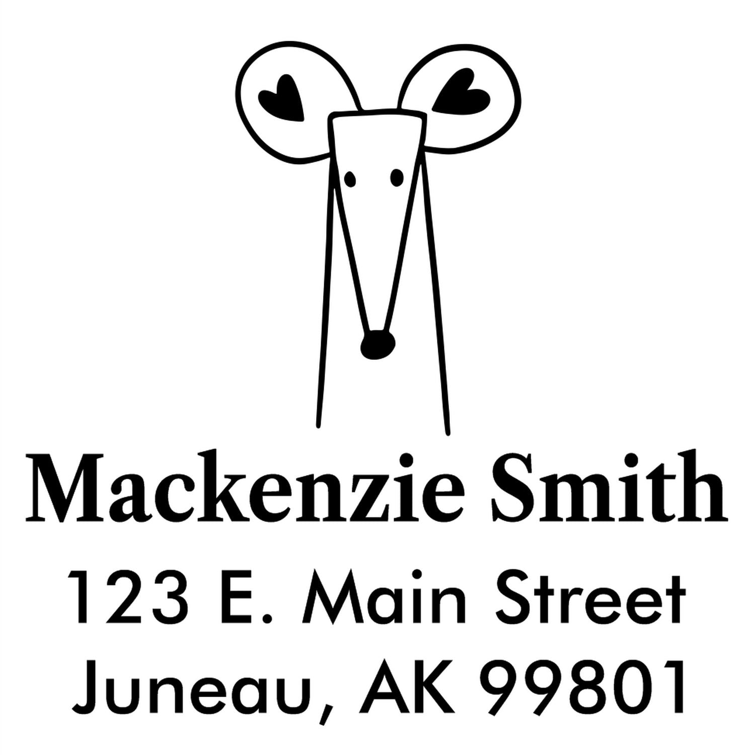 Image of a Portable Pre-Inked Mighty Mouse Made To Order Return Address Stamp featuring a cute mouse design with heart-shaped ears. The text reads "Mackenzie Smith, 123 E. Main Street, Juneau, AK 99801." Ideal for a Custom New Address Stamp.