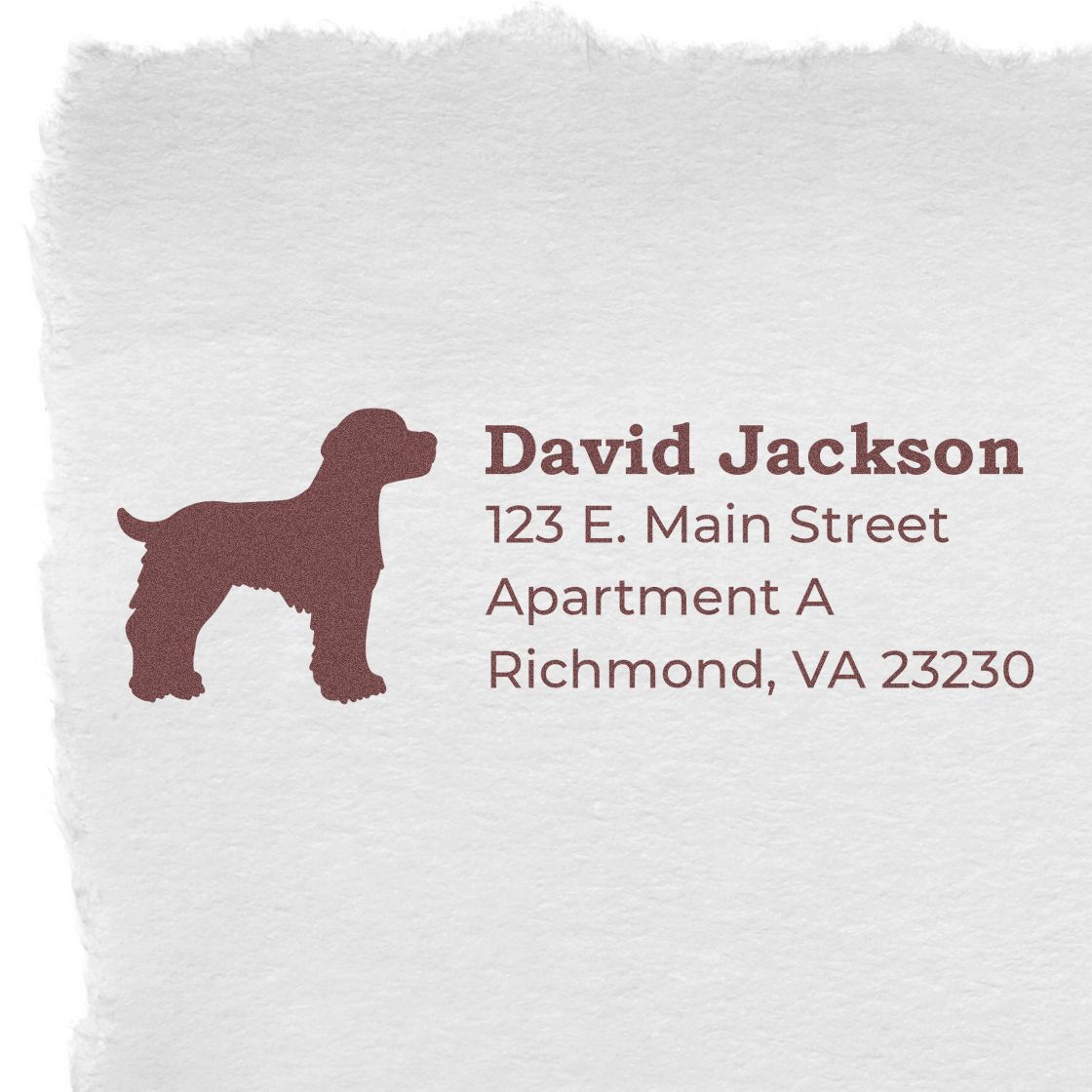 PSI Pre-Inked Personalized Brittany Spaniel Address Stamp on textured paper, featuring a silhouette of a Brittany Spaniel and sample address text in elegant font.