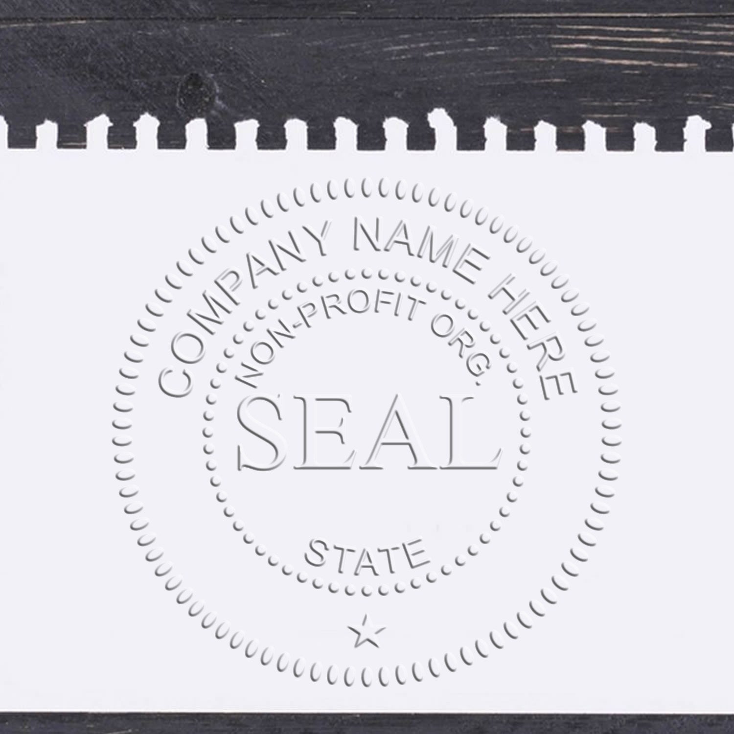 Embossed silver nonprofit company seal stamp template on white paper with black scalloped border.
