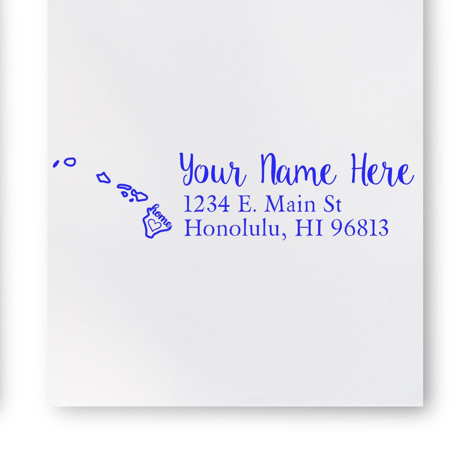 Hawaii state rubber address stamp with wooden handle and custom return address design by ESS in use.