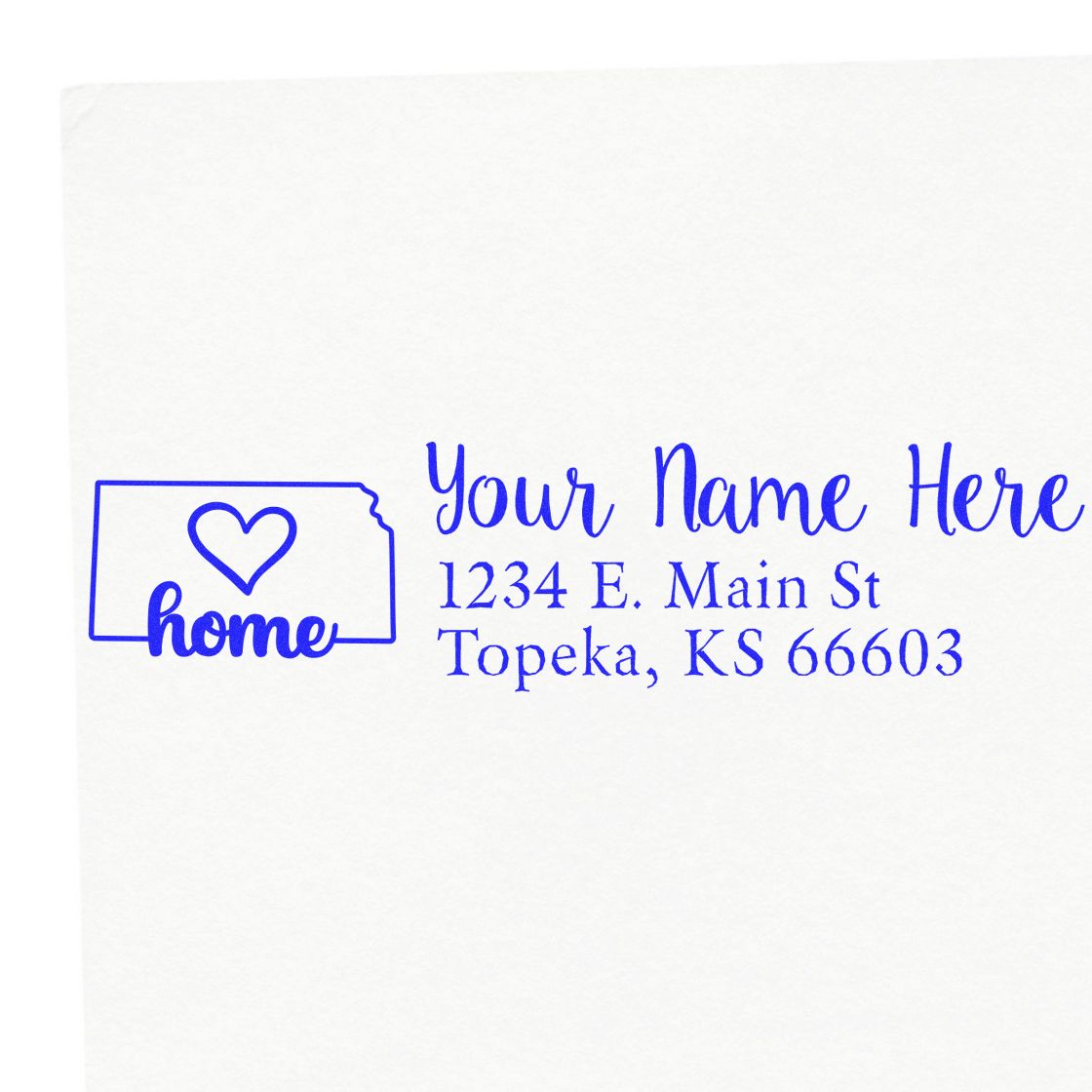 Kansas state love rubber address stamp with wood handle by ESS, showing the stamp in use on paper.