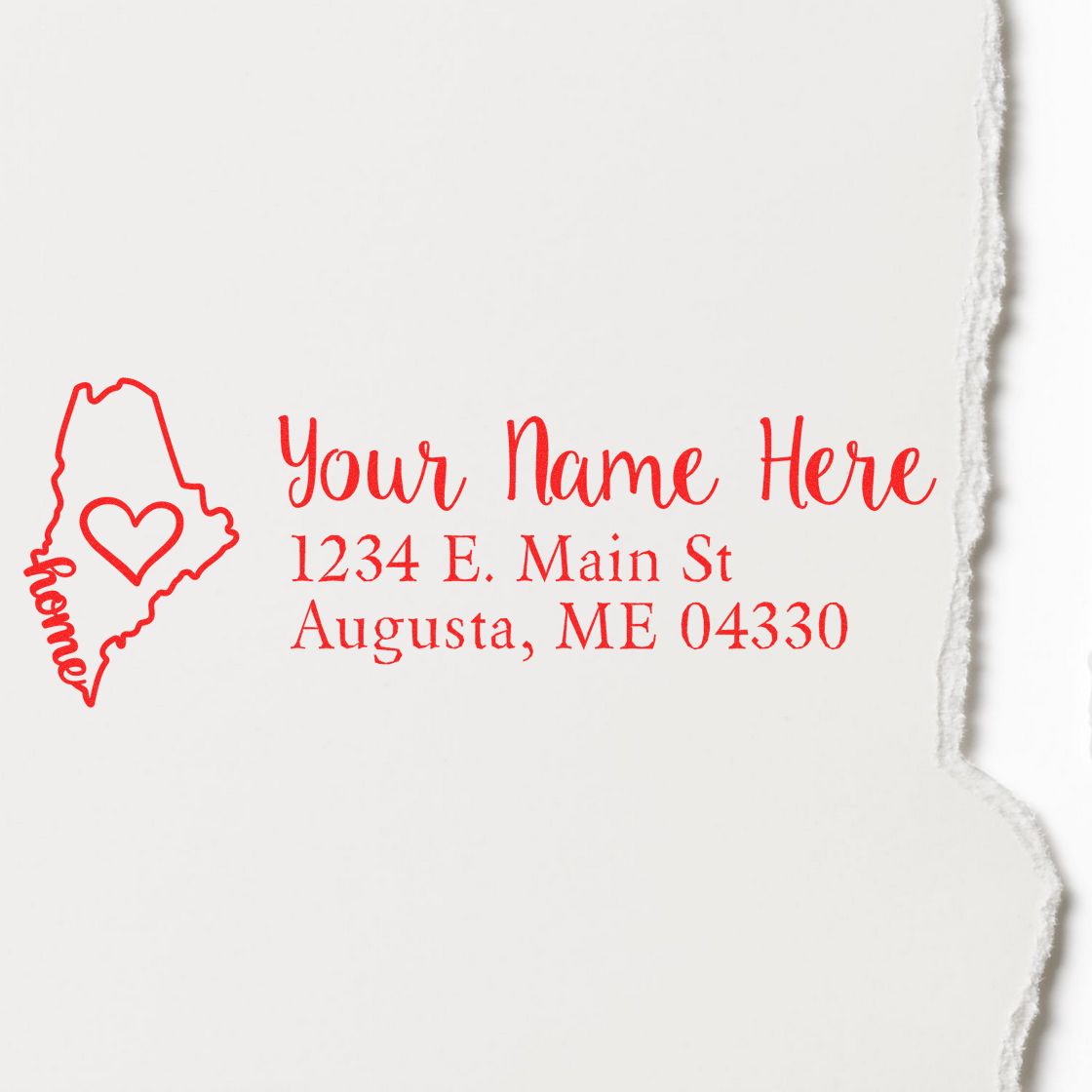 ESS Maine State Love Rubber Stamp with wood handle, showing a custom return address design in use.