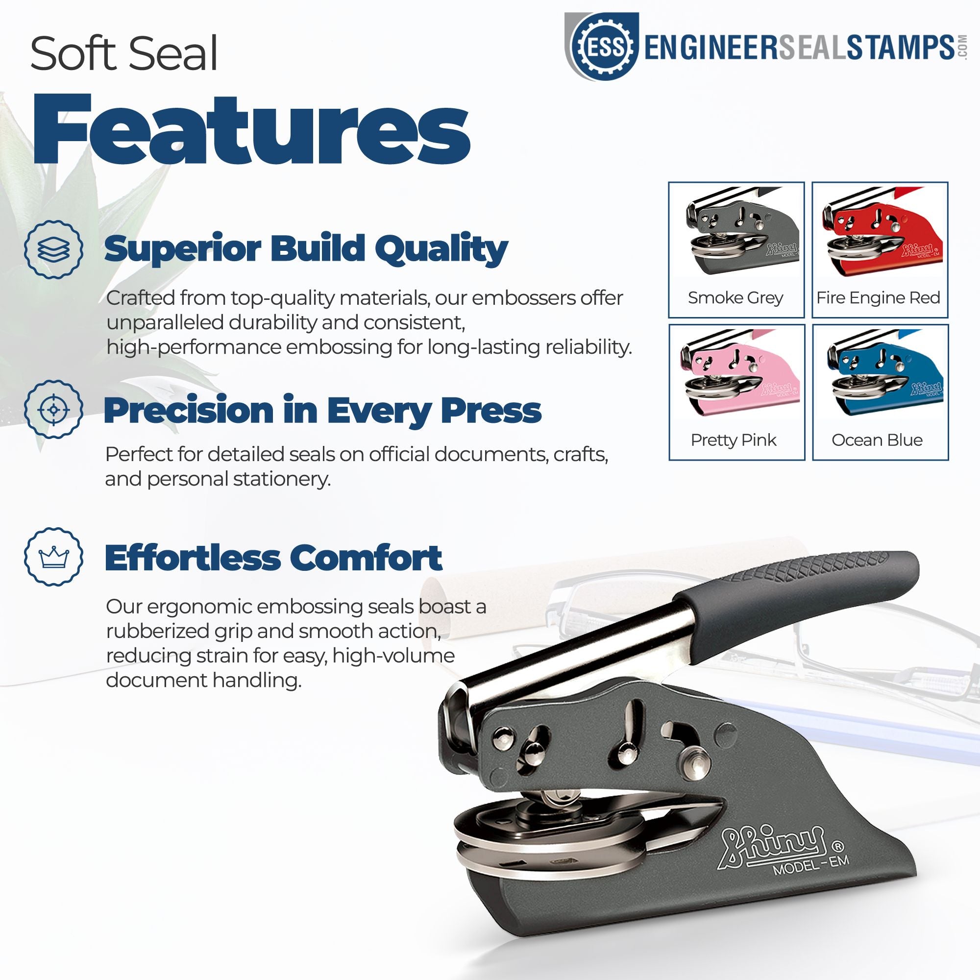 Soft seal embosser stamp features in smoke grey, fire engine red, pretty pink, and ocean blue with ergonomic black handle.