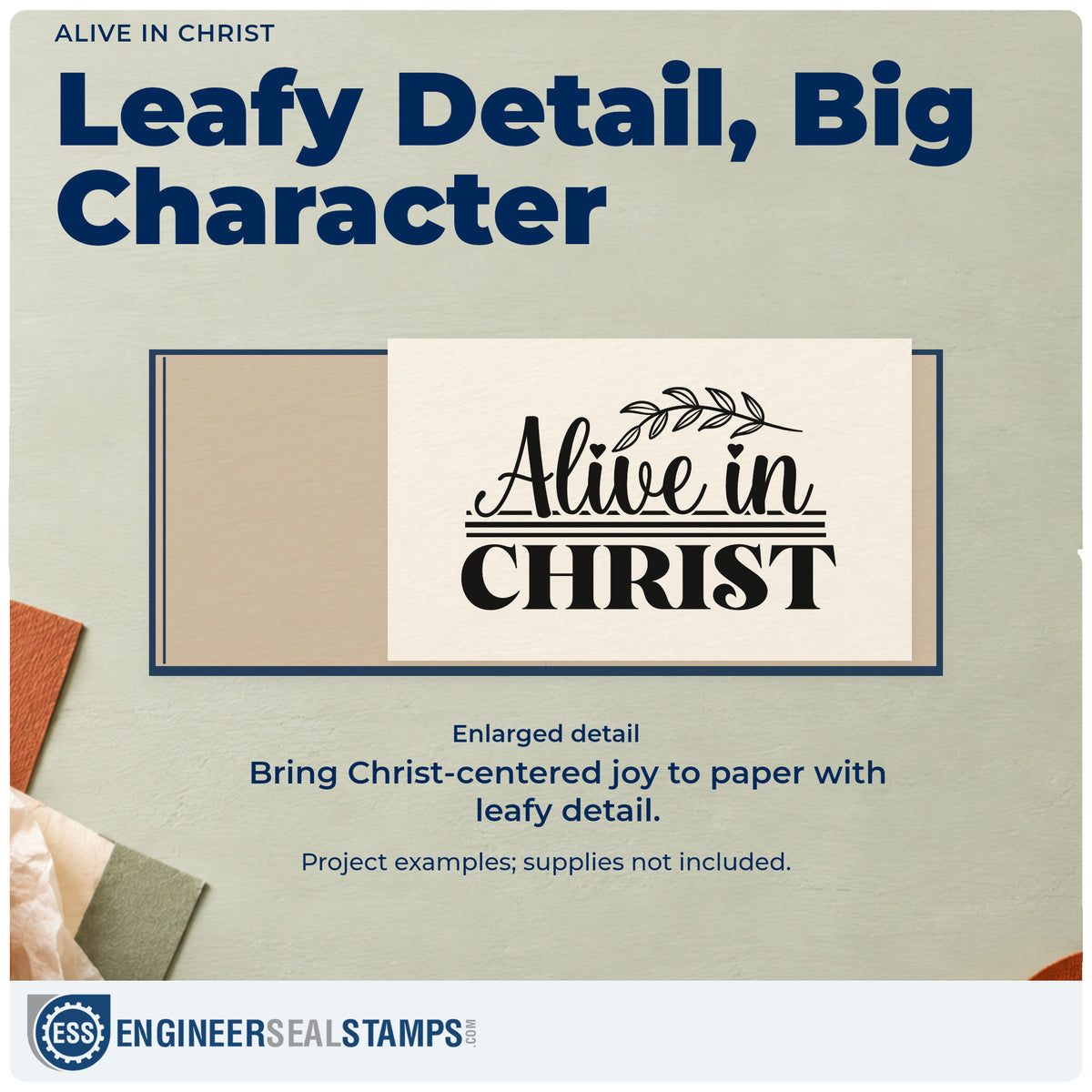 Enlarged detail of the Vintage Pro Alive In Christ Premium Wooden Stamp imprint. A leafy branch and horizontal rules accent "Alive in Christ" in script and bold serif lettering.