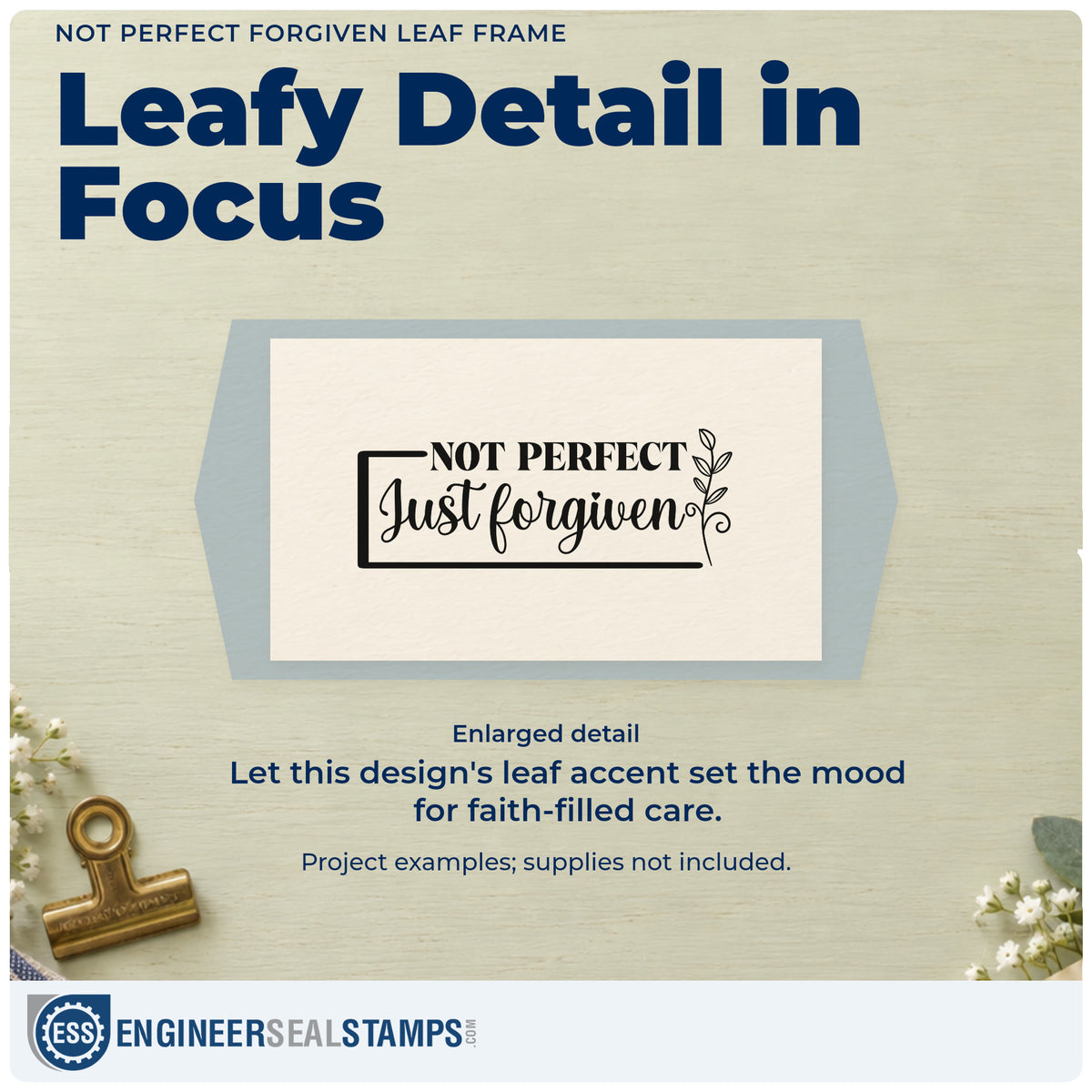Enlarged detail of the Not Perfect Forgiven Leaf Framed Lettering Rubber Stamp – Duo Hand imprint. A small leafy sprig accents a rectangular "Not perfect, just forgiven" design.