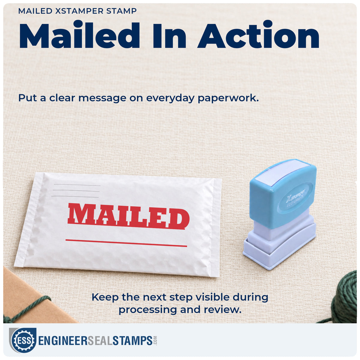 "Mailed" stamp being pressed onto a document during everyday filing