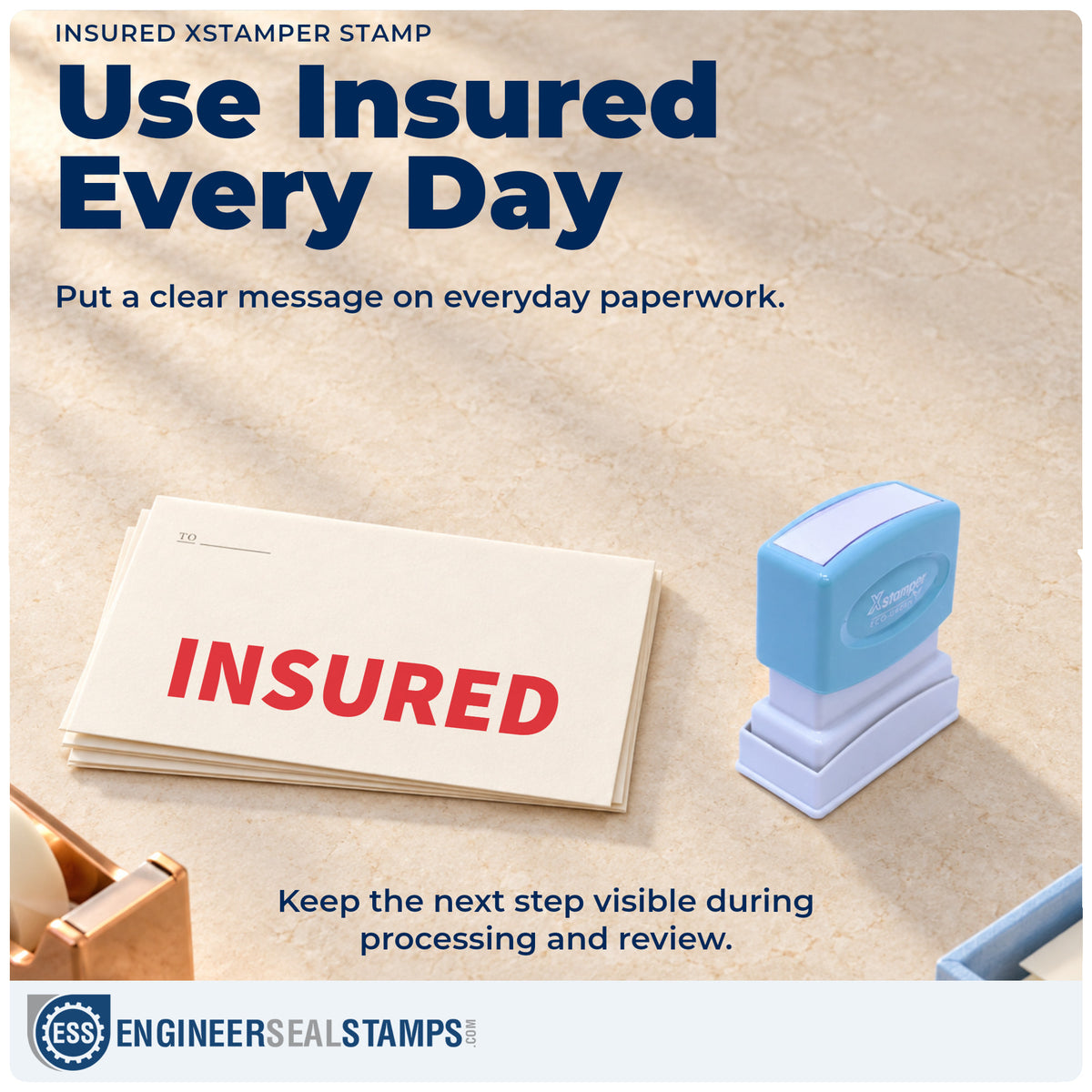 "Insured" stamp being pressed onto a document during everyday filing
