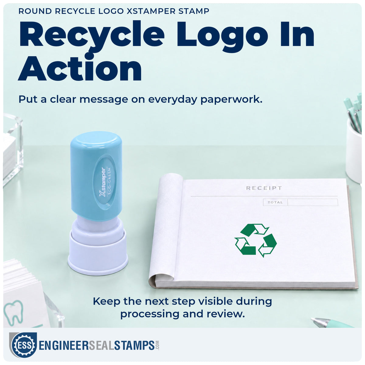 "Recycle logo" stamp being pressed onto a document during everyday filing