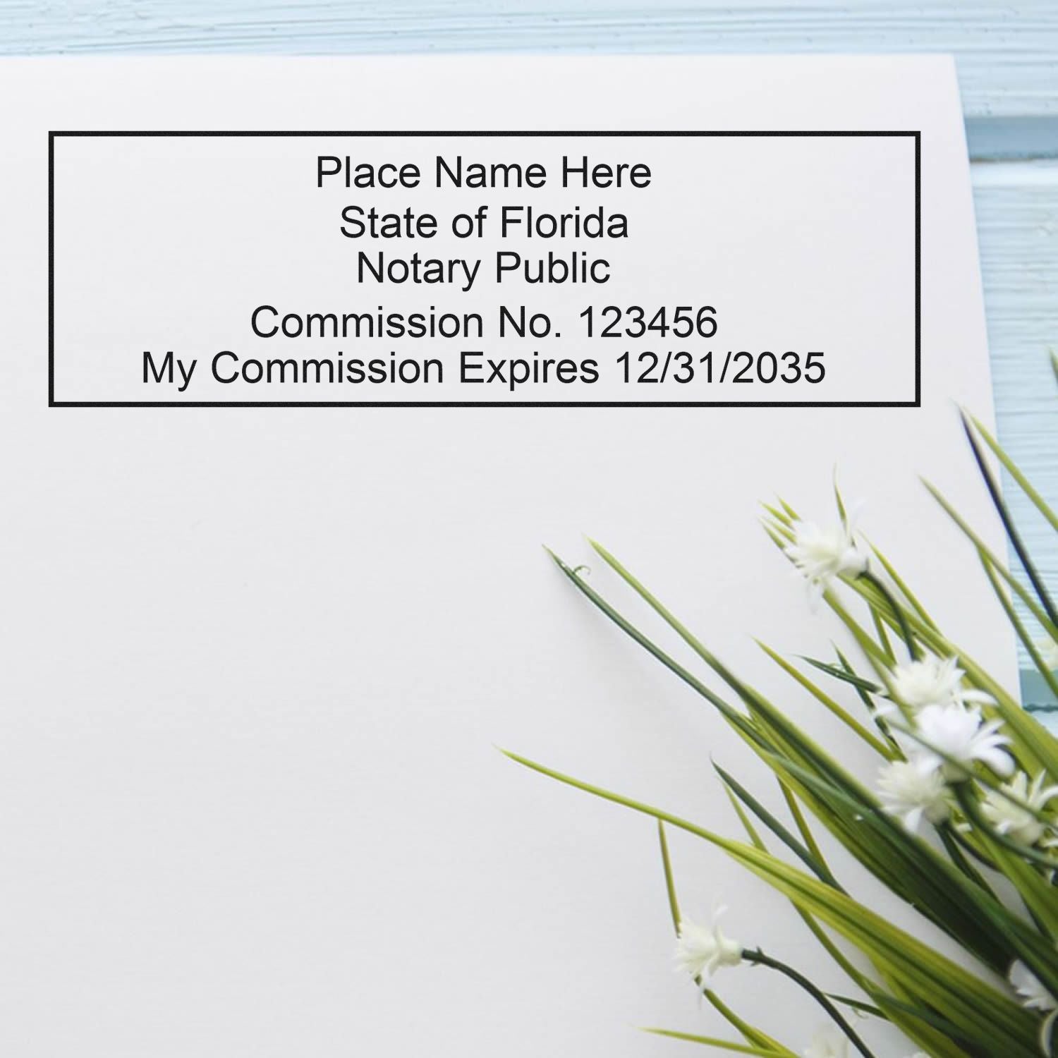 White Florida notary public stamp seal with black border, commission number 123456 and expiration date 12/31/2035, on white background.