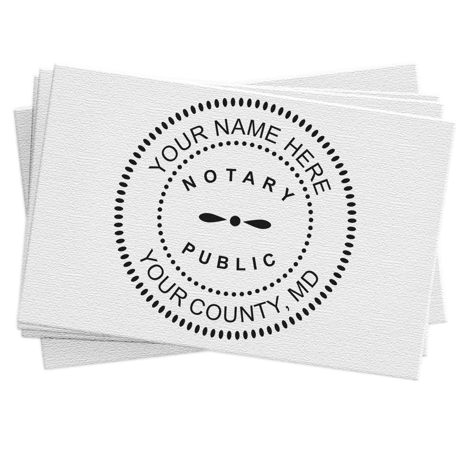 Black circular notary public seal stamp on white textured fabric, with dotted border and personalized name and county text.
