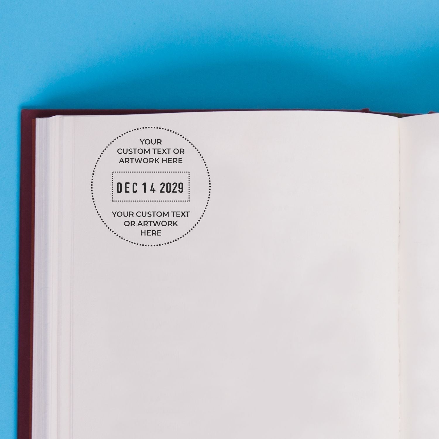 Custom black dotted date stamp seal on a white page against a blue background, reading Dec 14 2029.