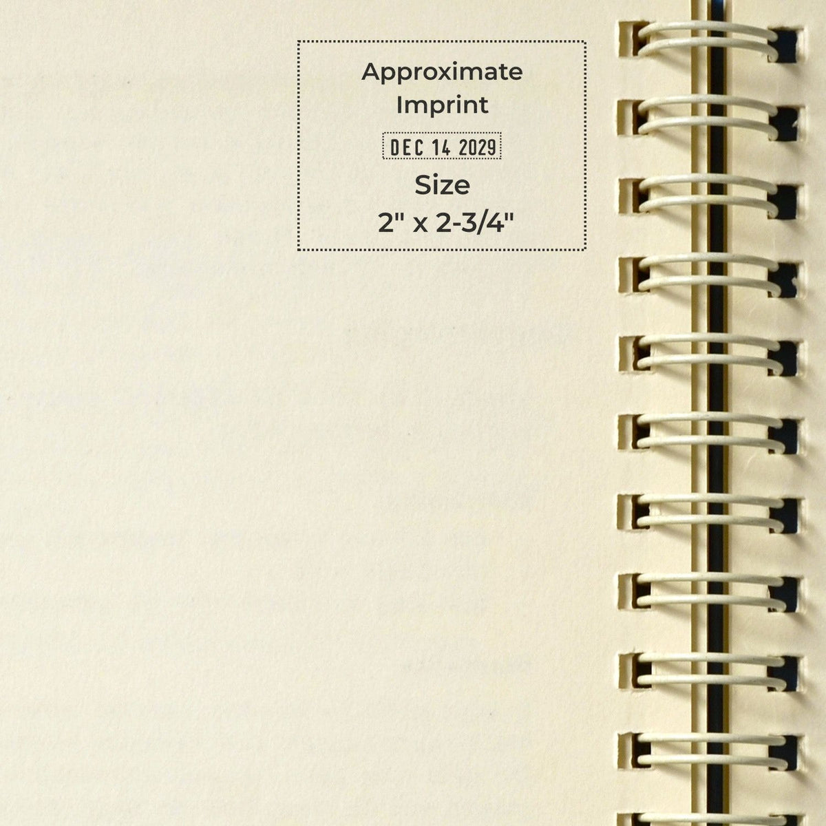 Cream spiral notebook page with black stamp/seal imprint details, dotted border, DEC 14 2029, 2" x 2-3/4".