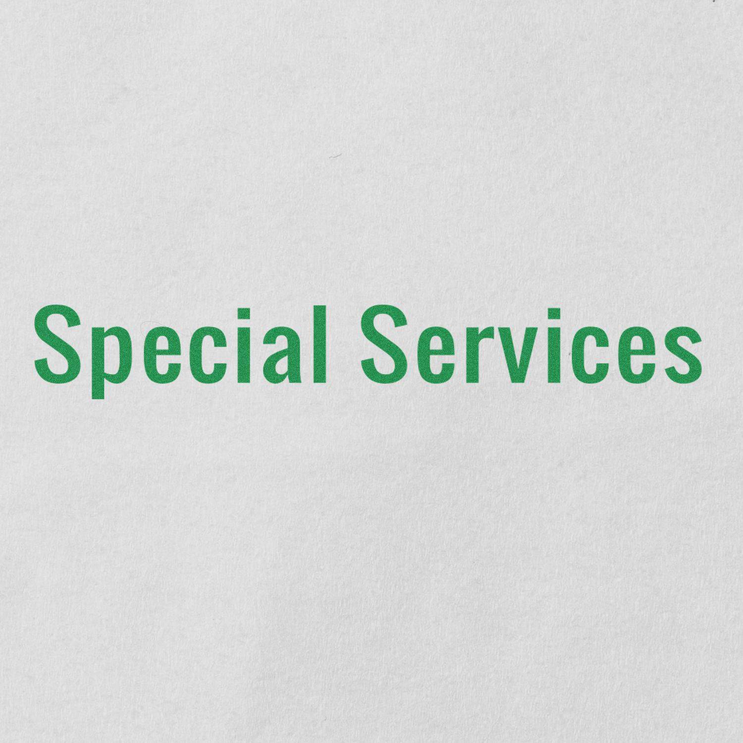 Image of a Large Pre-Inked Special Services Stamp imprint with green text reading Special Services on a white background.