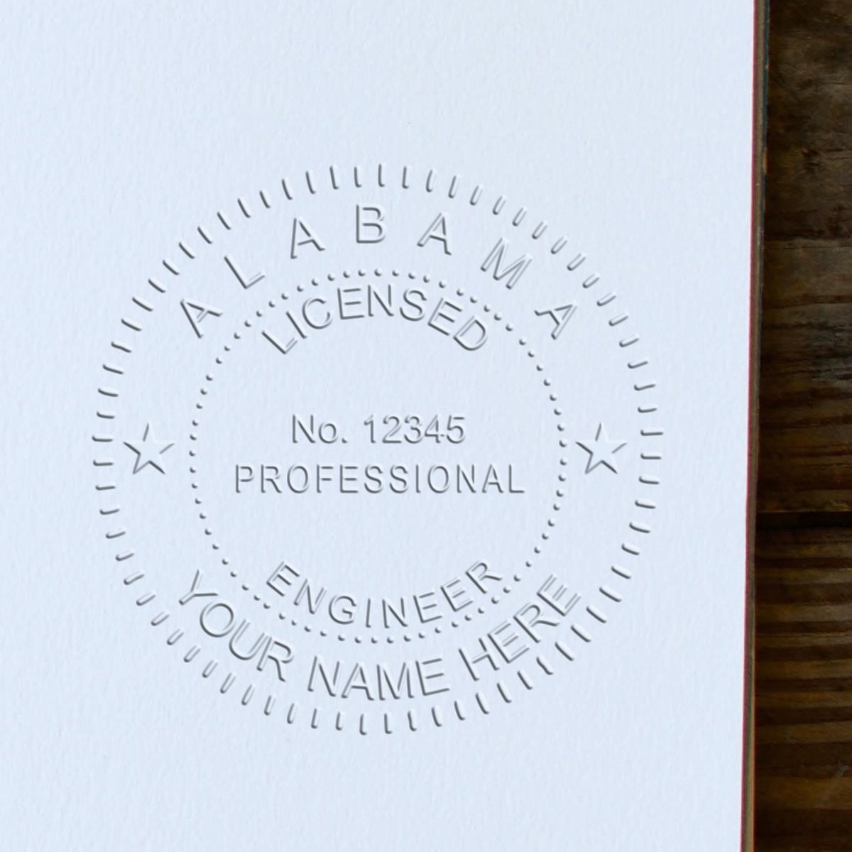 The State of Alabama Extended Long Reach Engineer Seal stamp impression comes to life with a crisp, detailed photo on paper - showcasing true professional quality.