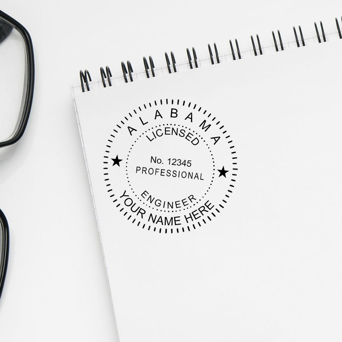 A stamped impression of the Alabama Professional Engineer Seal Stamp in this stylish lifestyle photo, setting the tone for a unique and personalized product.