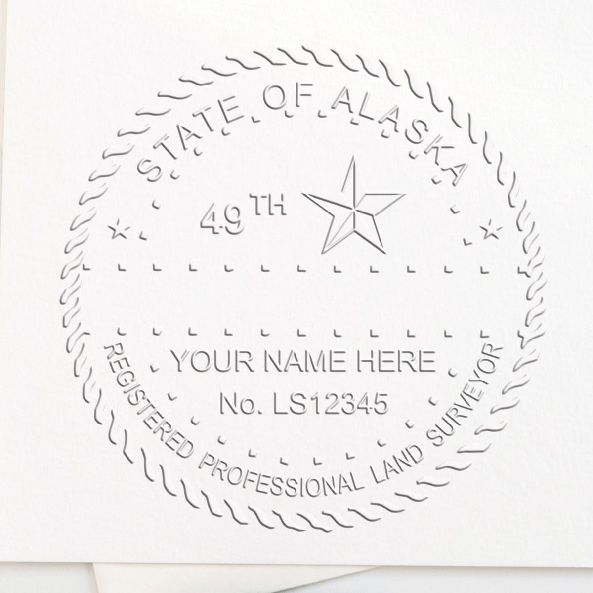 A lifestyle photo showing a stamped image of the State of Alaska Soft Land Surveyor Embossing Seal on a piece of paper