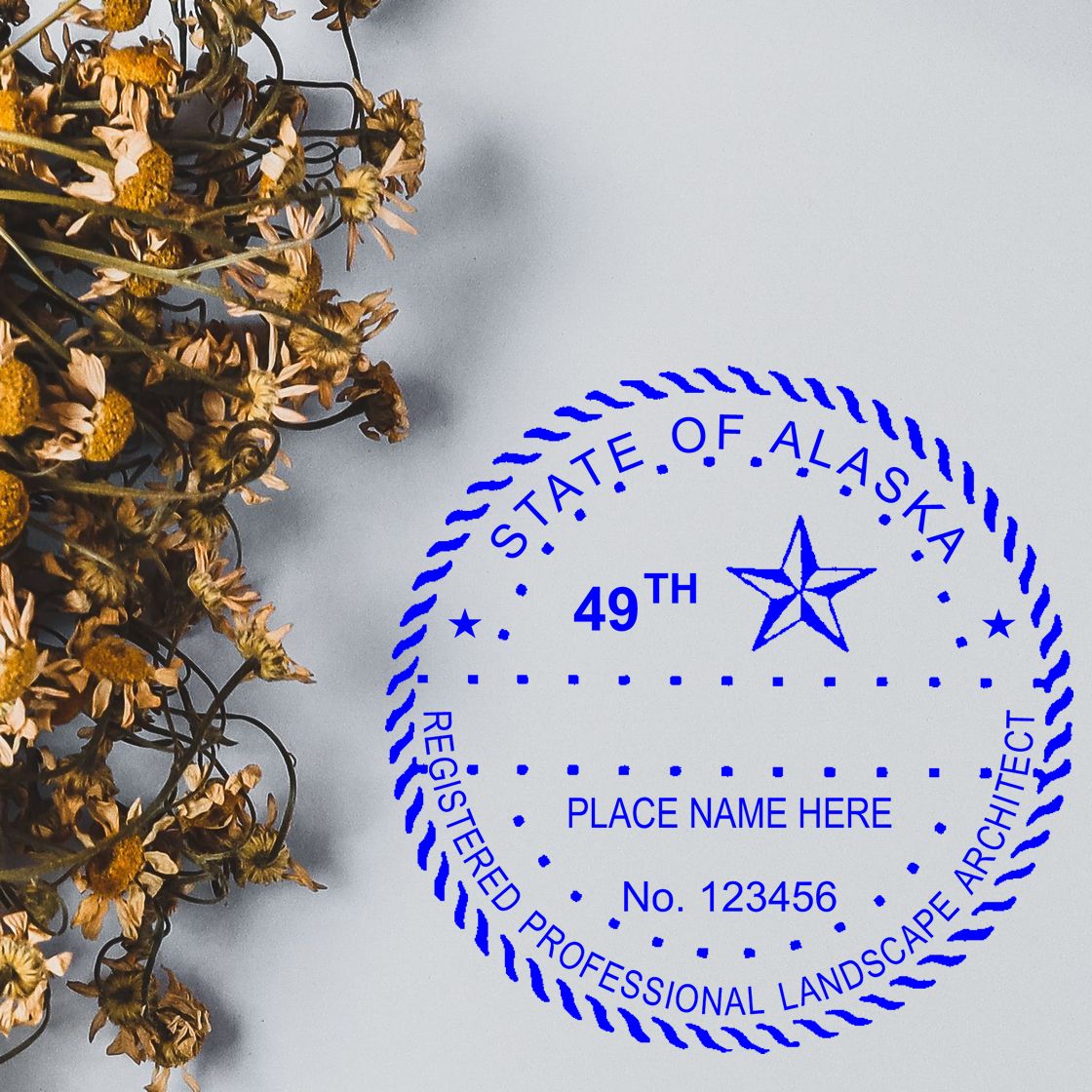 Another Example of a stamped impression of the Slim Pre-Inked Alaska Landscape Architect Seal Stamp on a piece of office paper.